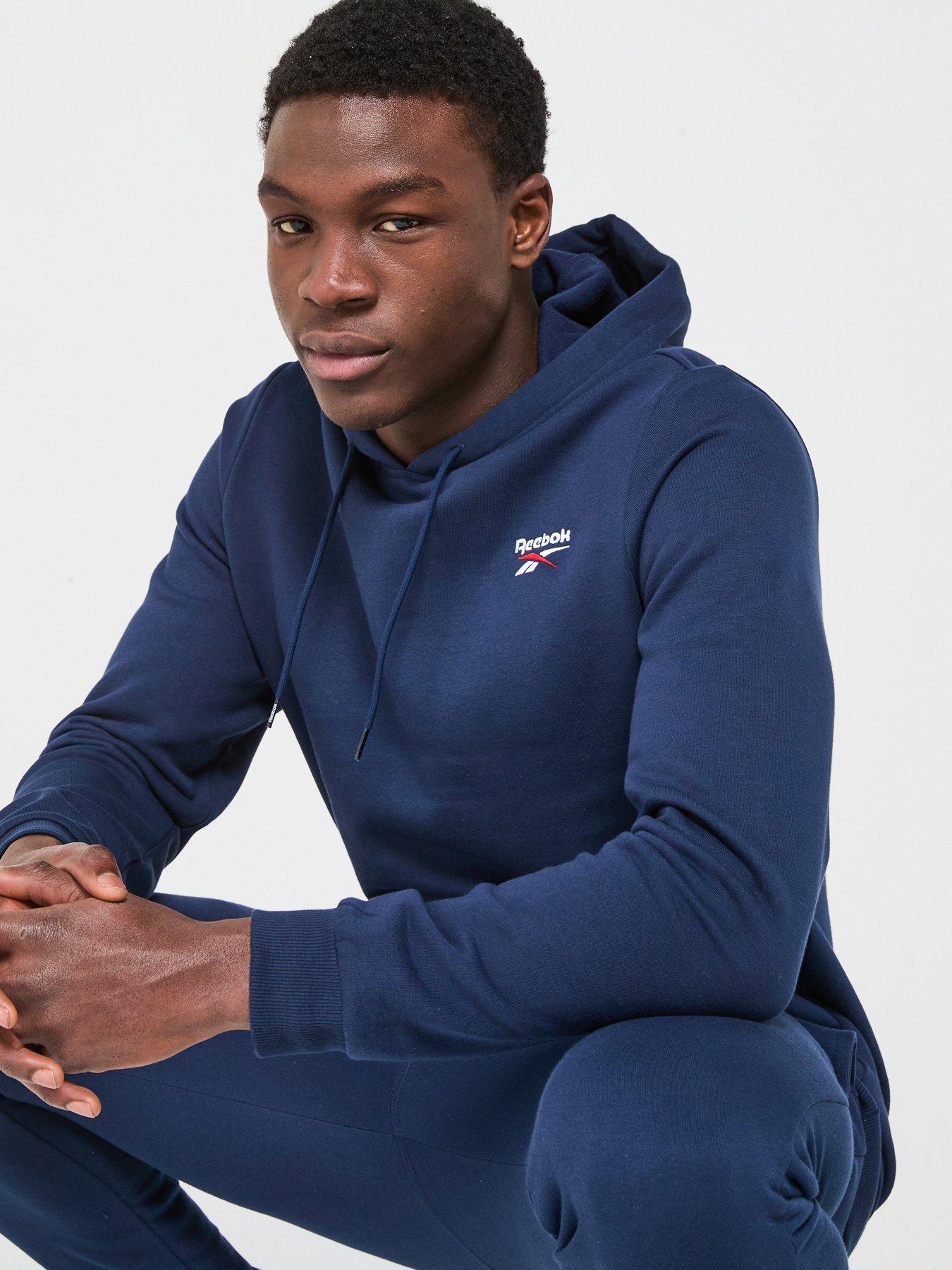  image of reebok-mens-identity-small-logo-fleece-hoodie-navy