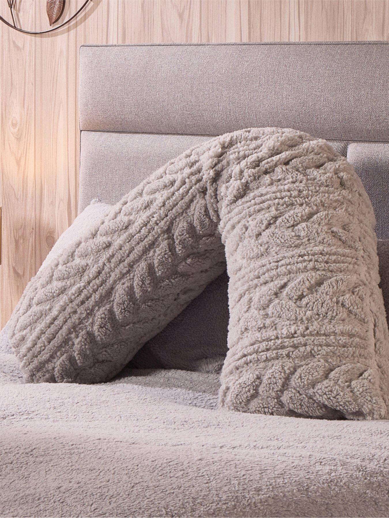 front image of the-very-collection-cable-knit-v-shaped-pillow