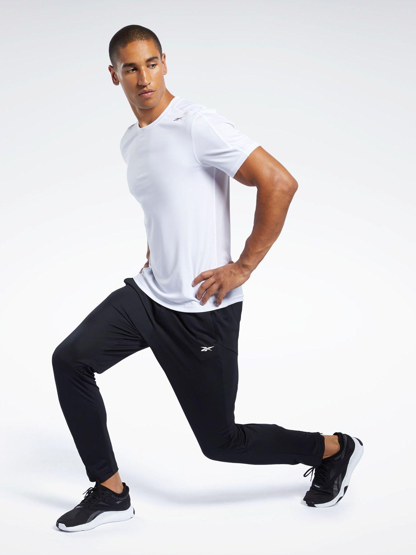  image of reebok-mens-training-id-train-knit-pants-black
