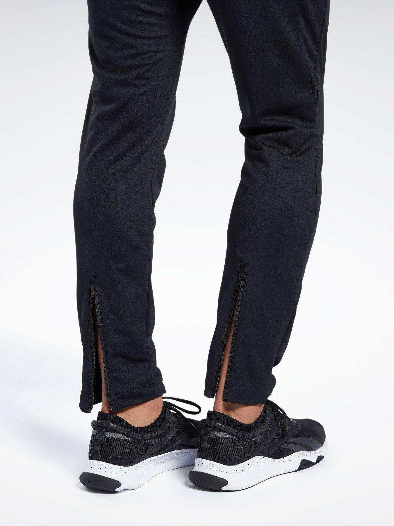  image of reebok-mens-training-id-train-knit-pants-black