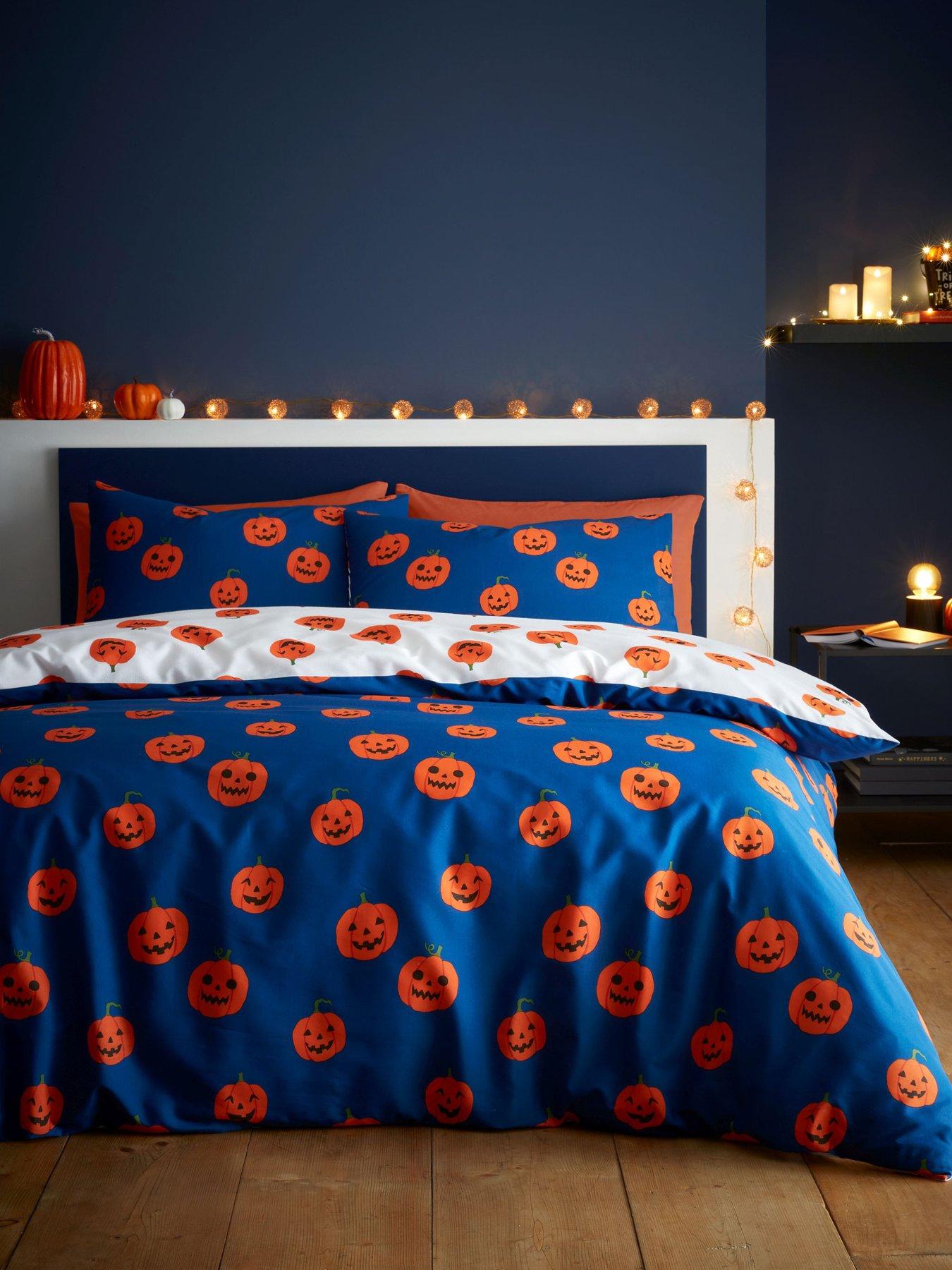 Image 1 of 6 of Catherine Lansfield Halloween Pumpkins Reversible Duvet Cover Set - Navy
