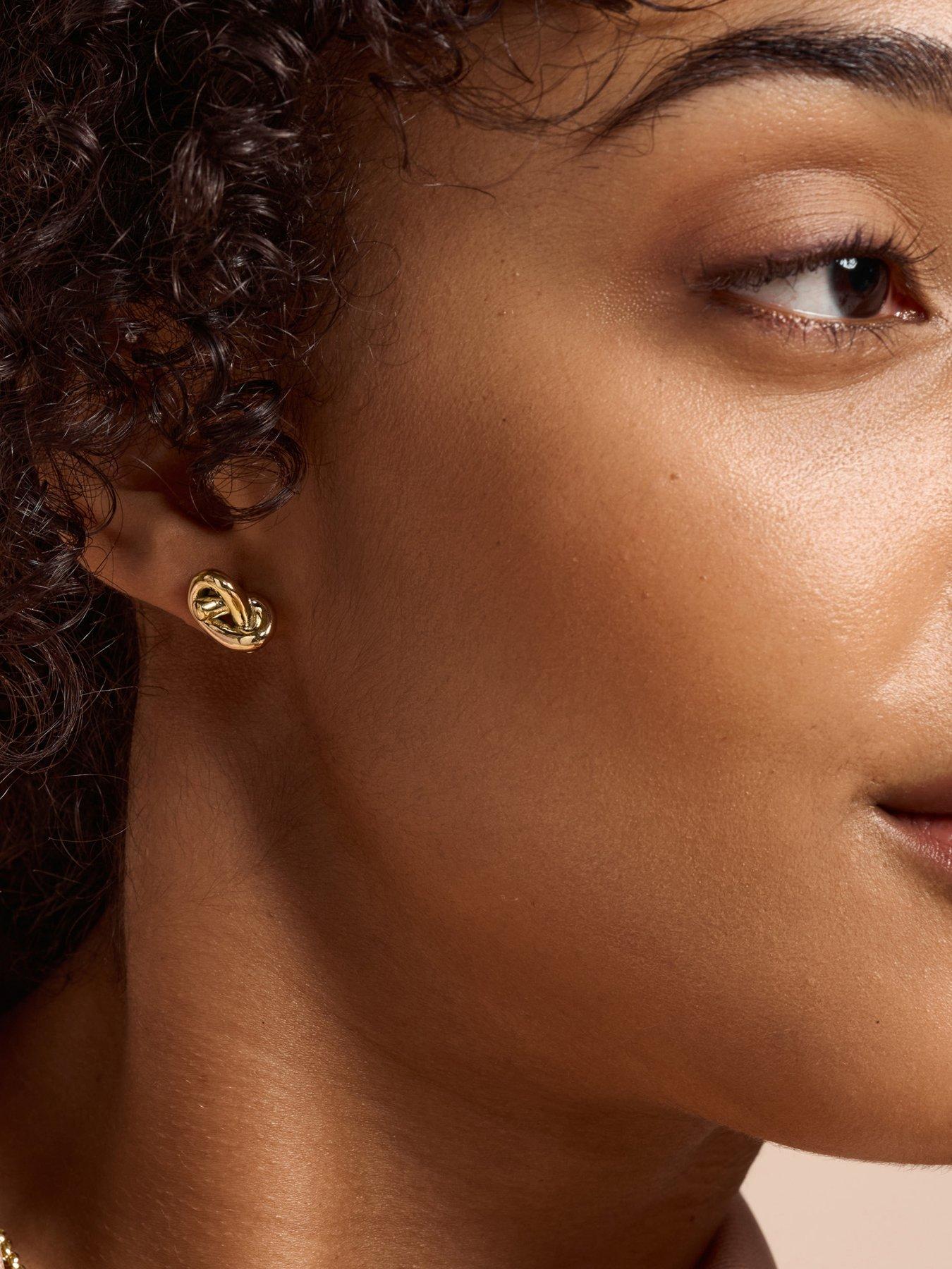  image of olivia-burton-lovers-knot-gold-ip-stud-earrings