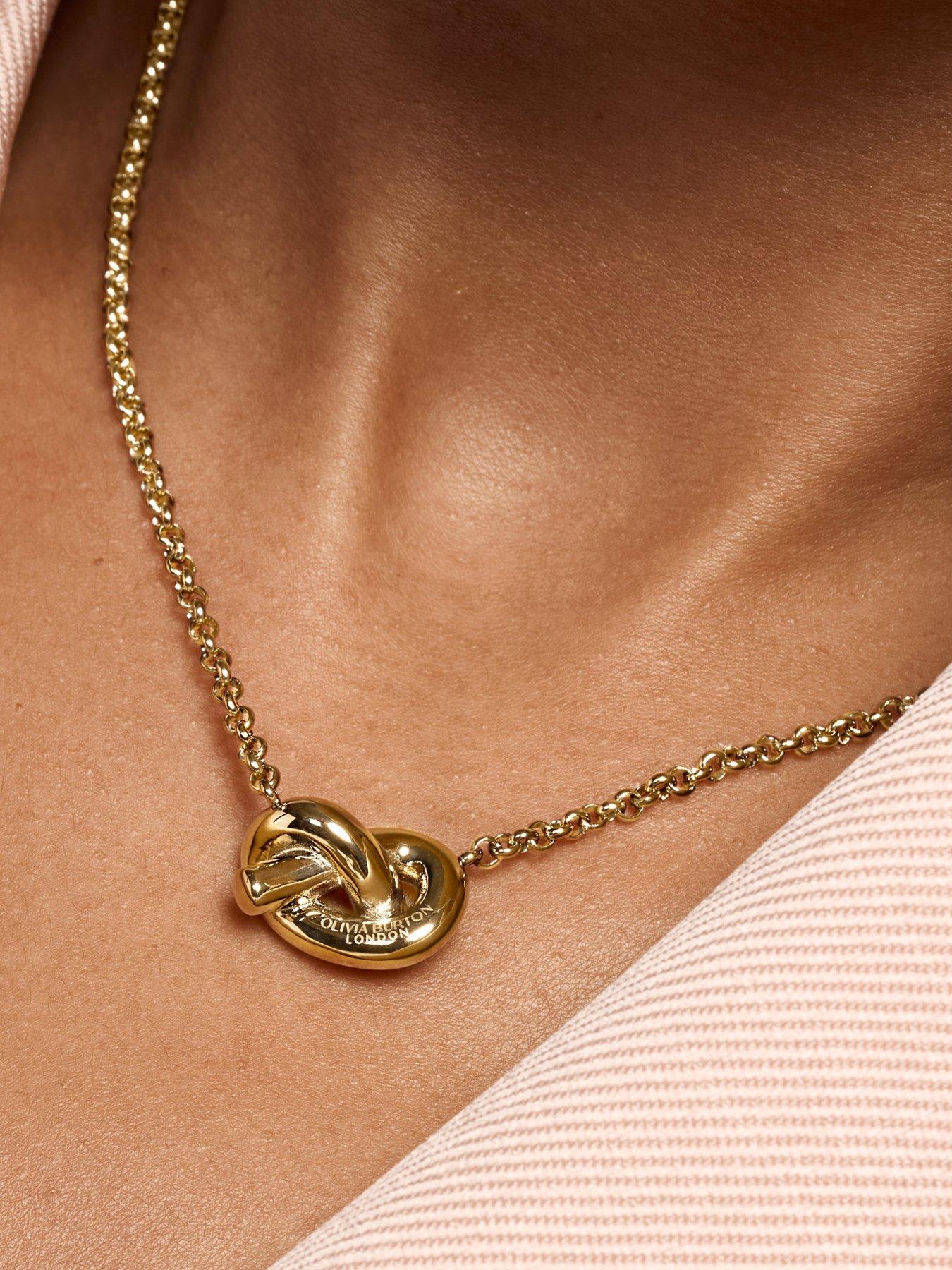 Image 3 of 7 of Olivia Burton Lovers Knot Gold IP Necklace
