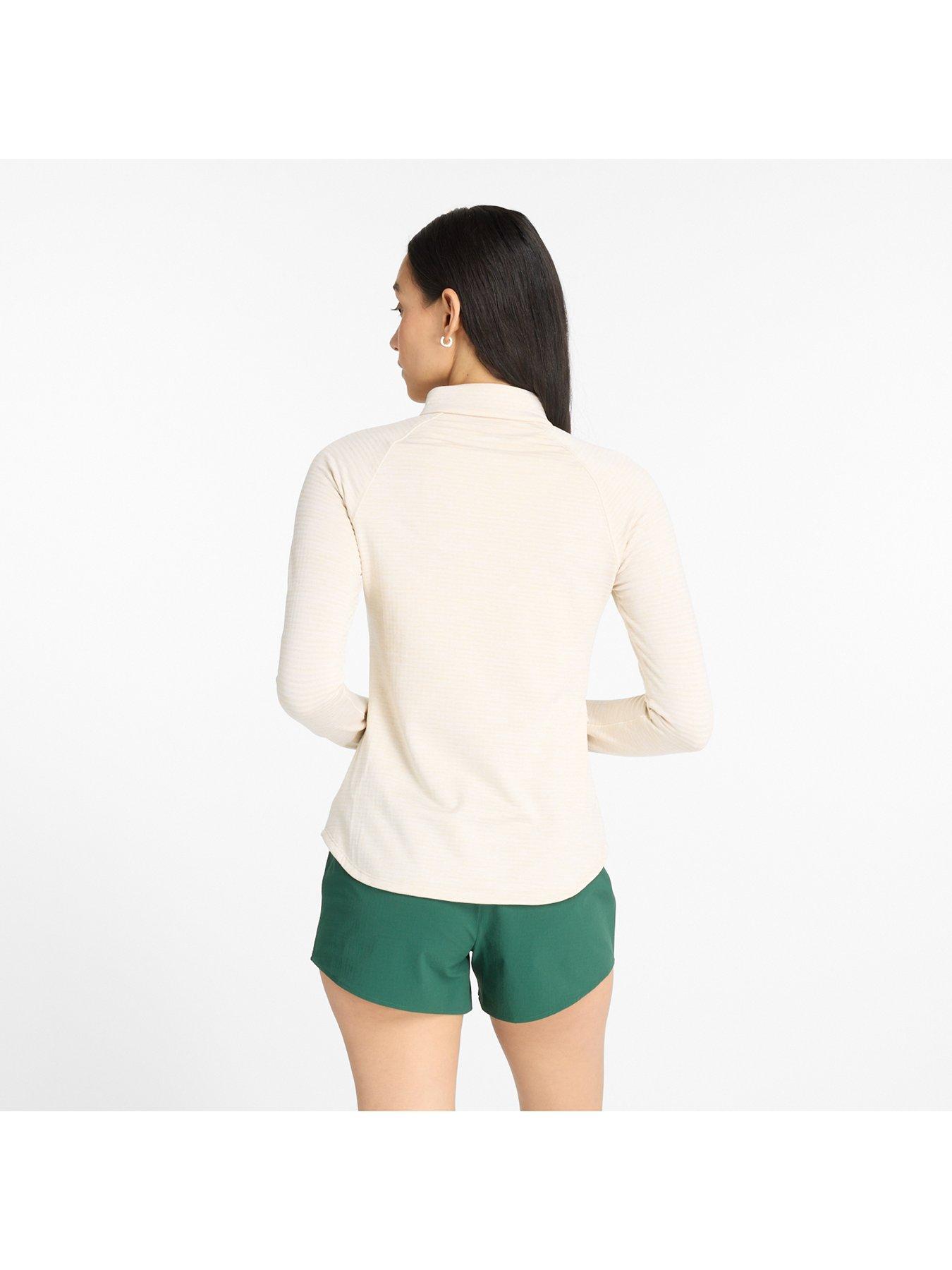  image of new-balance-womens-running-athletics-heat-grid-half-zip-beige