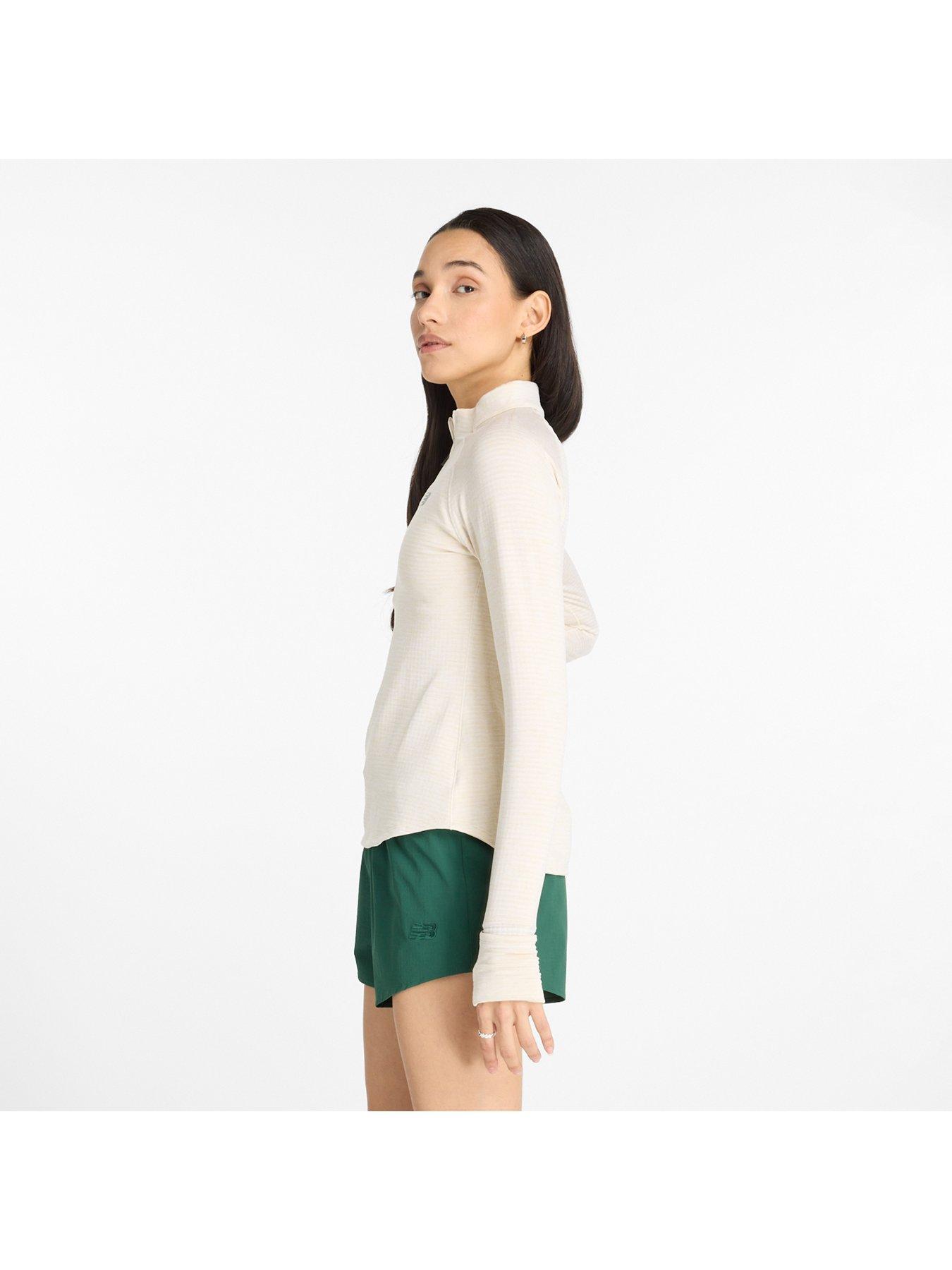  image of new-balance-womens-running-athletics-heat-grid-half-zip-beige