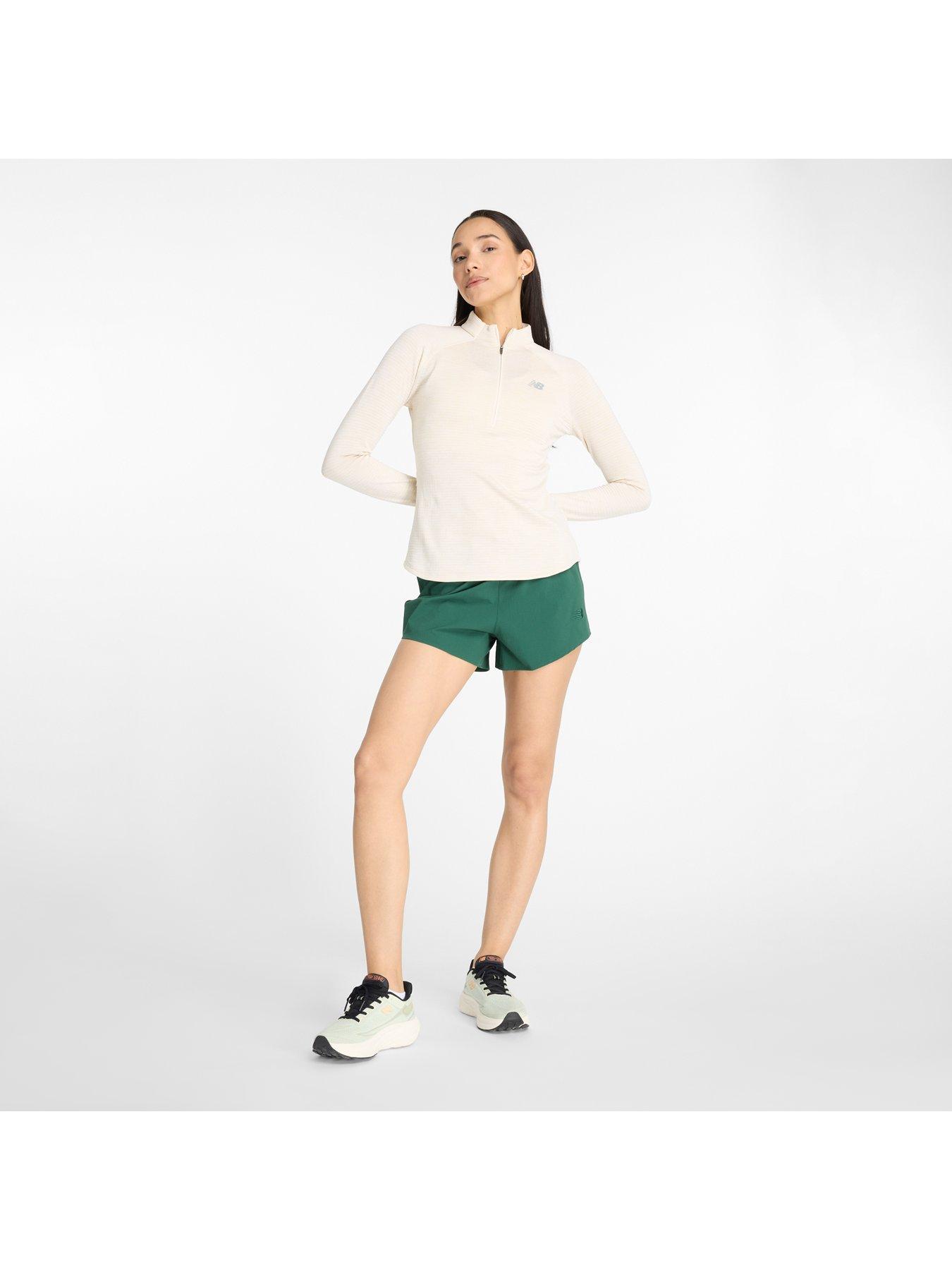  image of new-balance-womens-running-athletics-heat-grid-half-zip-beige