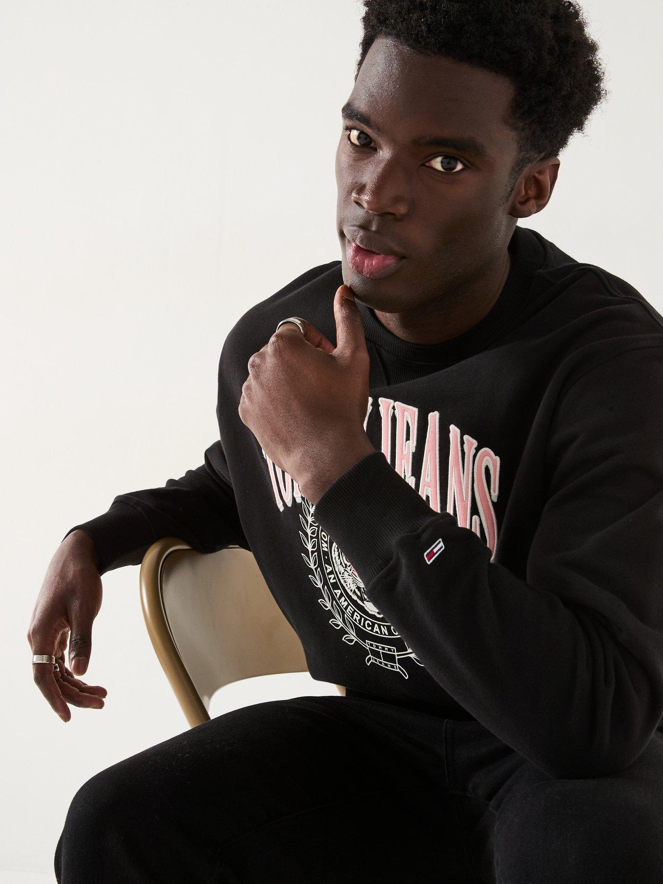  image of tommy-jeans-relaxed-fit-embroidered-varsity-crest-crew-sweat-black
