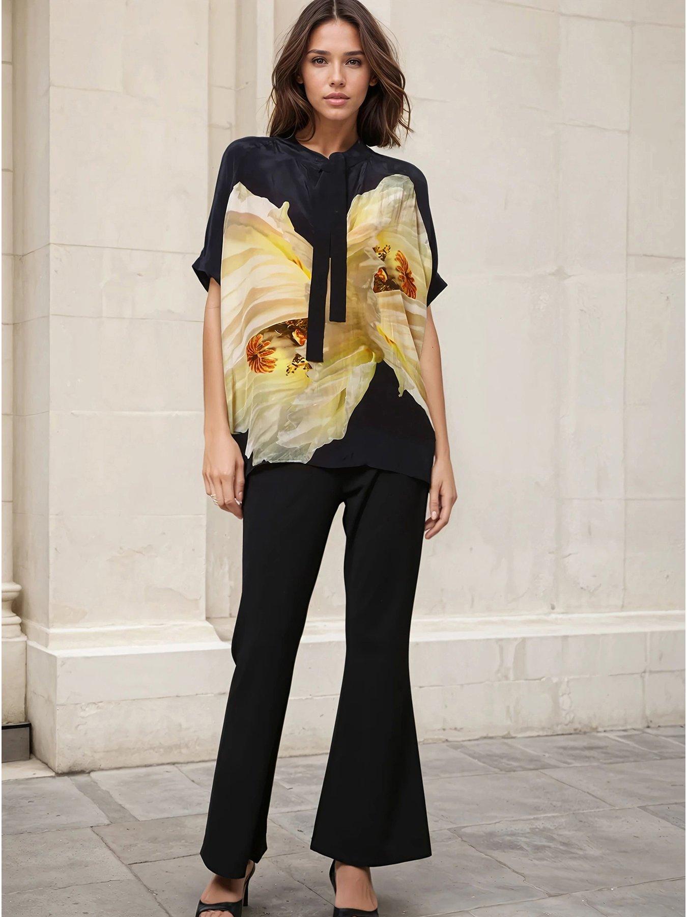 front image of religion-oversized-hidden-blouse-yellow