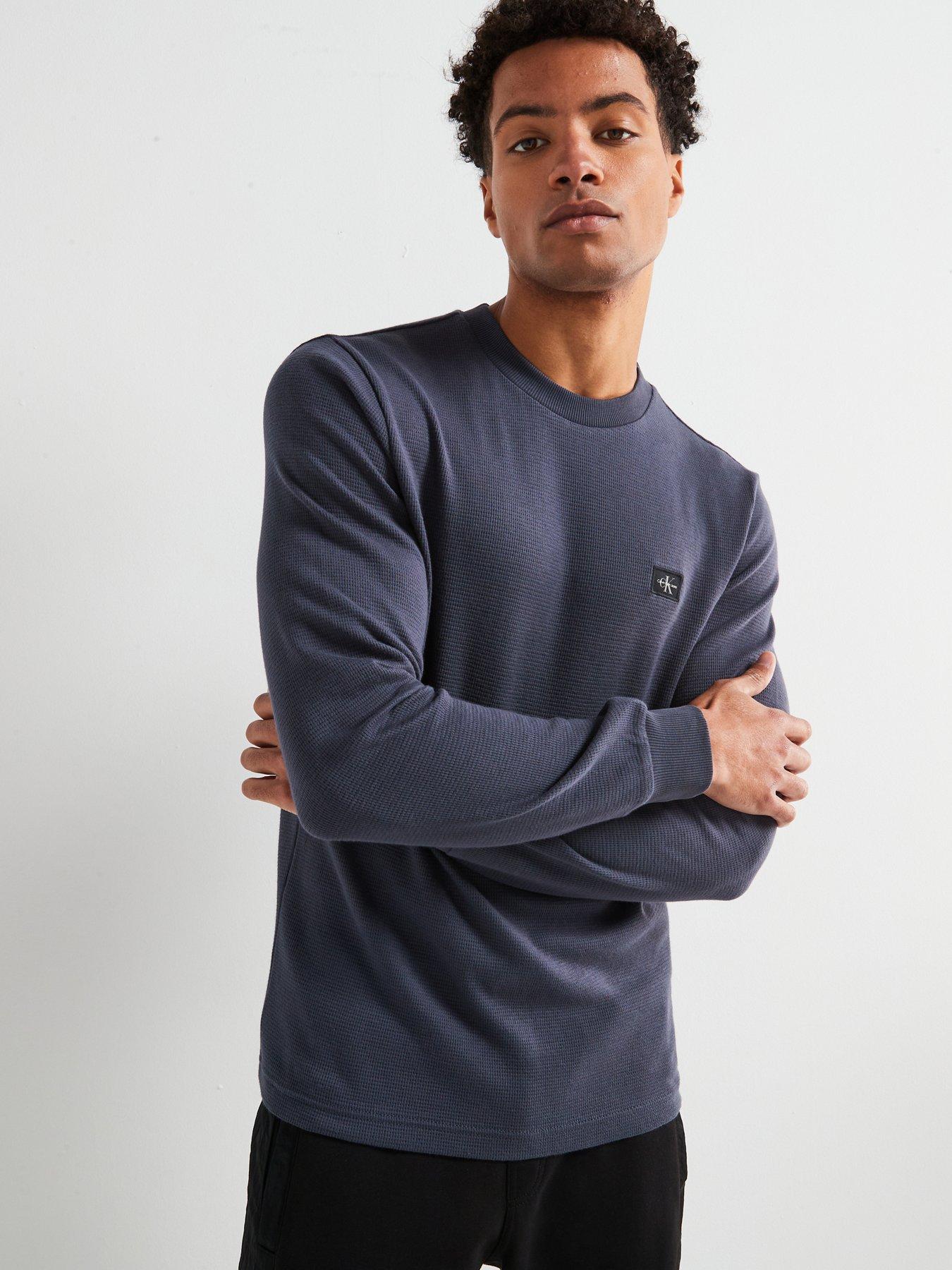 front image of calvin-klein-jeans-woven-label-waffle-long-sleeve-t-shirt-navy