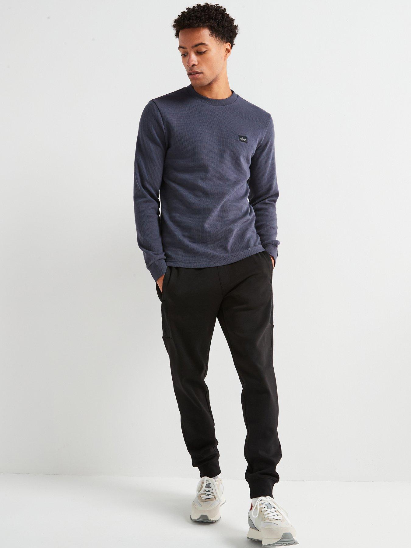  image of calvin-klein-jeans-woven-label-waffle-long-sleeve-t-shirt-navy
