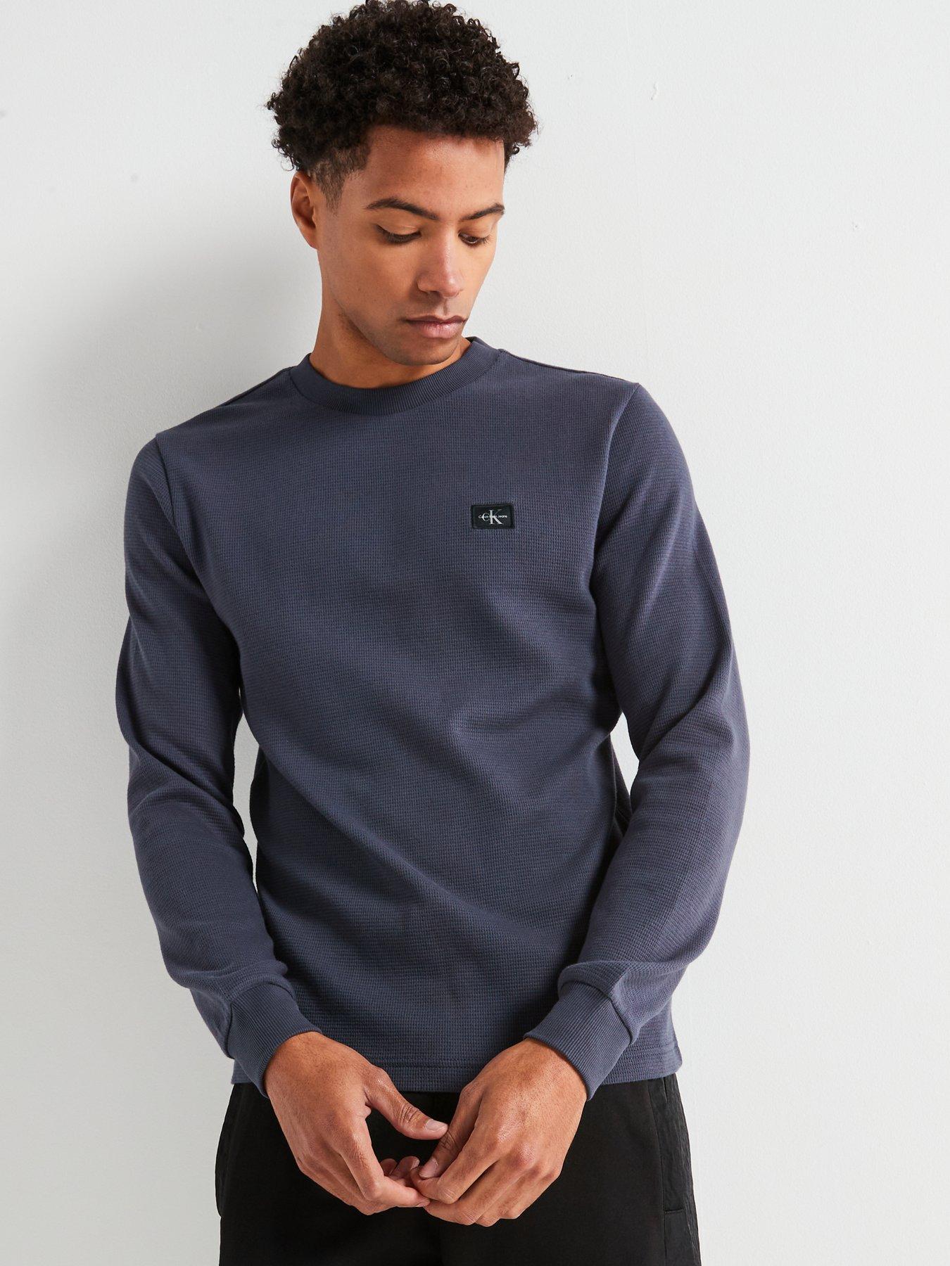  image of calvin-klein-jeans-woven-label-waffle-long-sleeve-t-shirt-navy