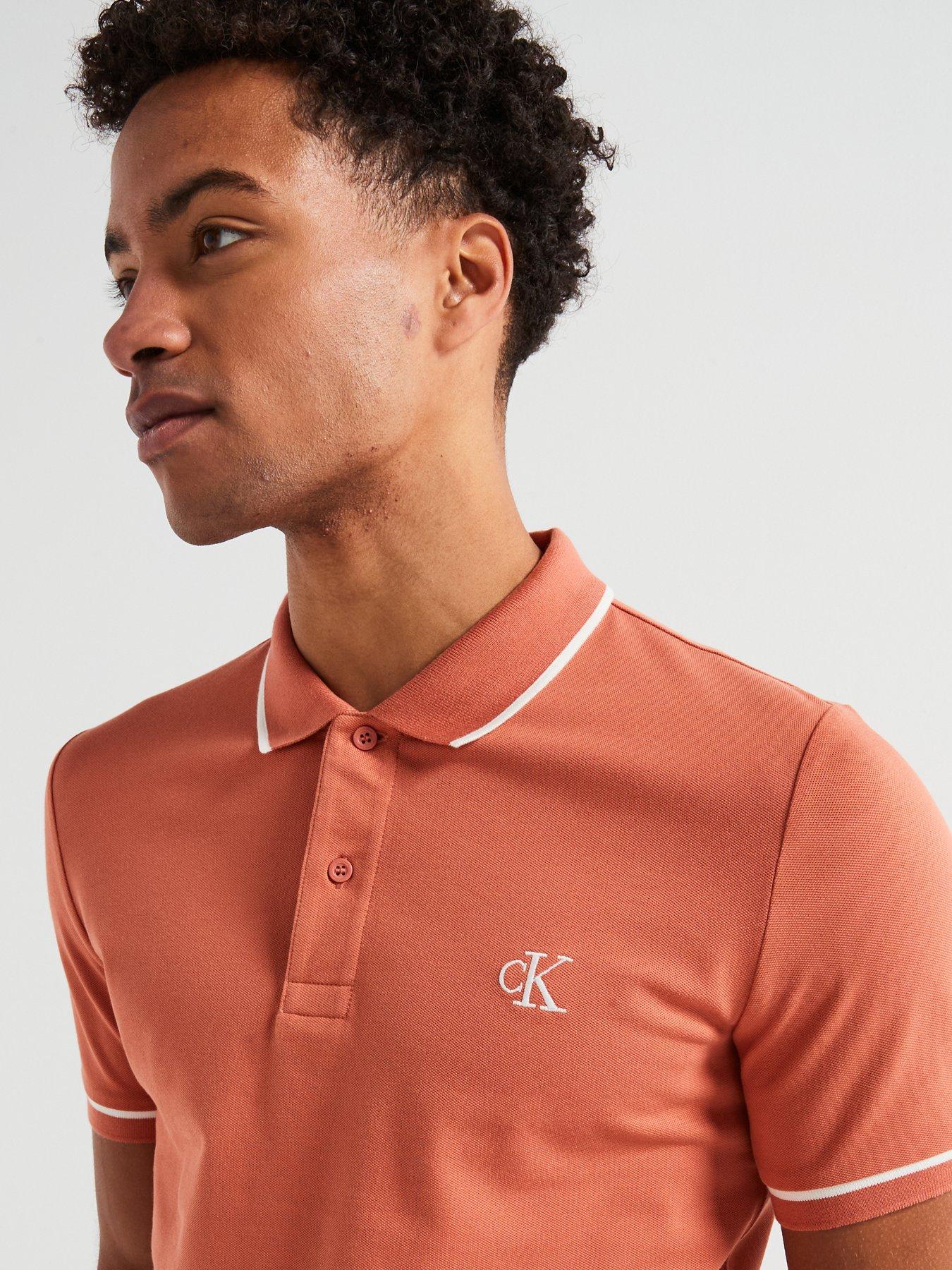  image of calvin-klein-jeans-tipping-slim-fit-polo-shirt-light-red