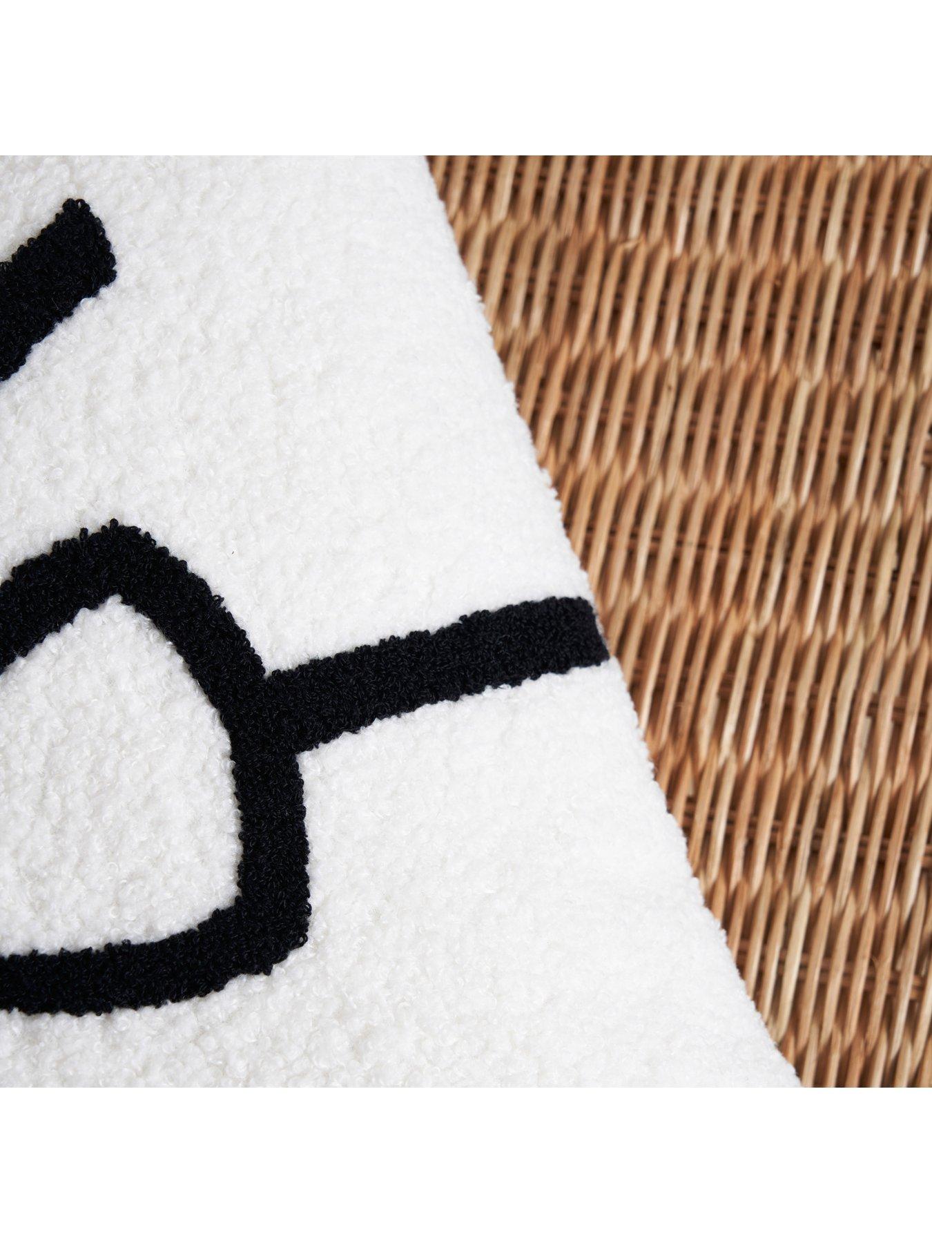  image of very-home-christmas-bow-tufted-cushion