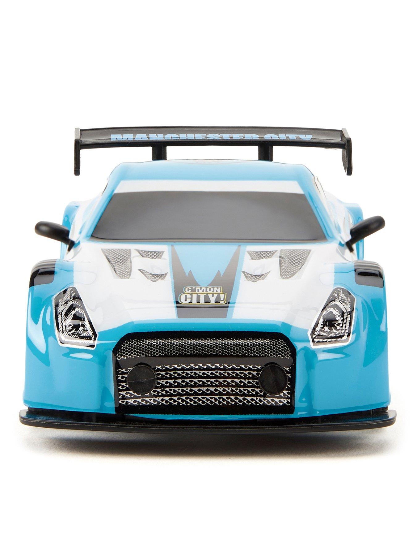  image of manchester-city-fc-remote-control-car-124-scale
