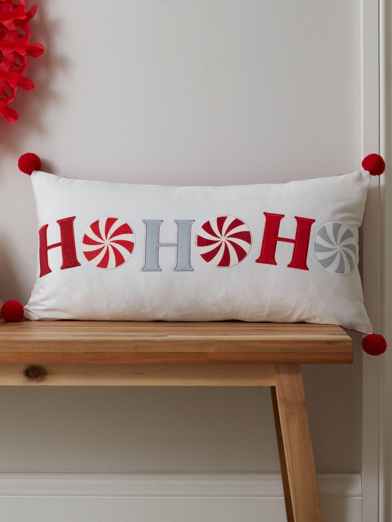  image of catherine-lansfield-ho-ho-ho-filled-christmas-cushion--30-x-60cm