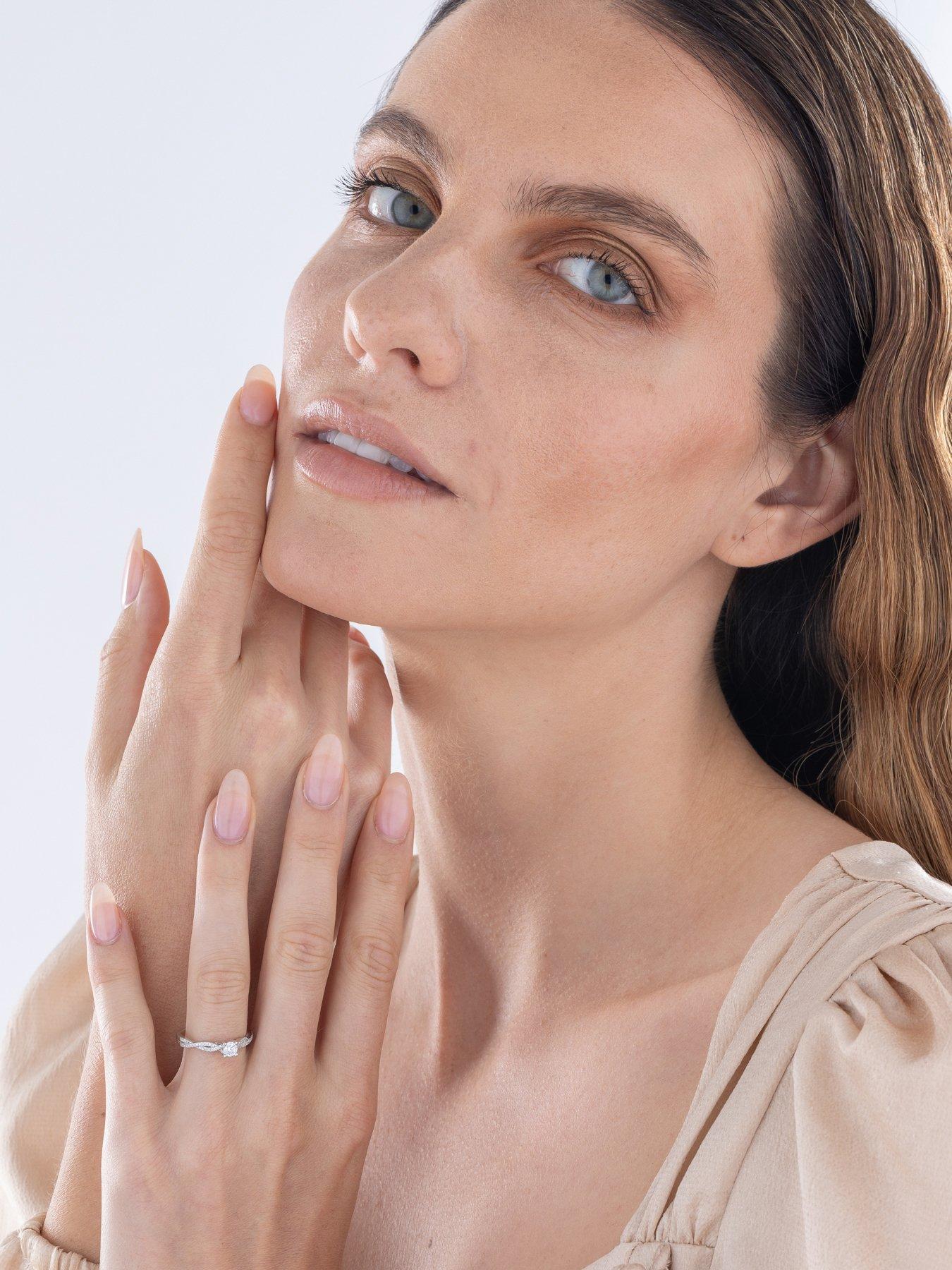  image of love-diamond-diamond-twisted-band-solitaire-ring-g-vs-lab-grown