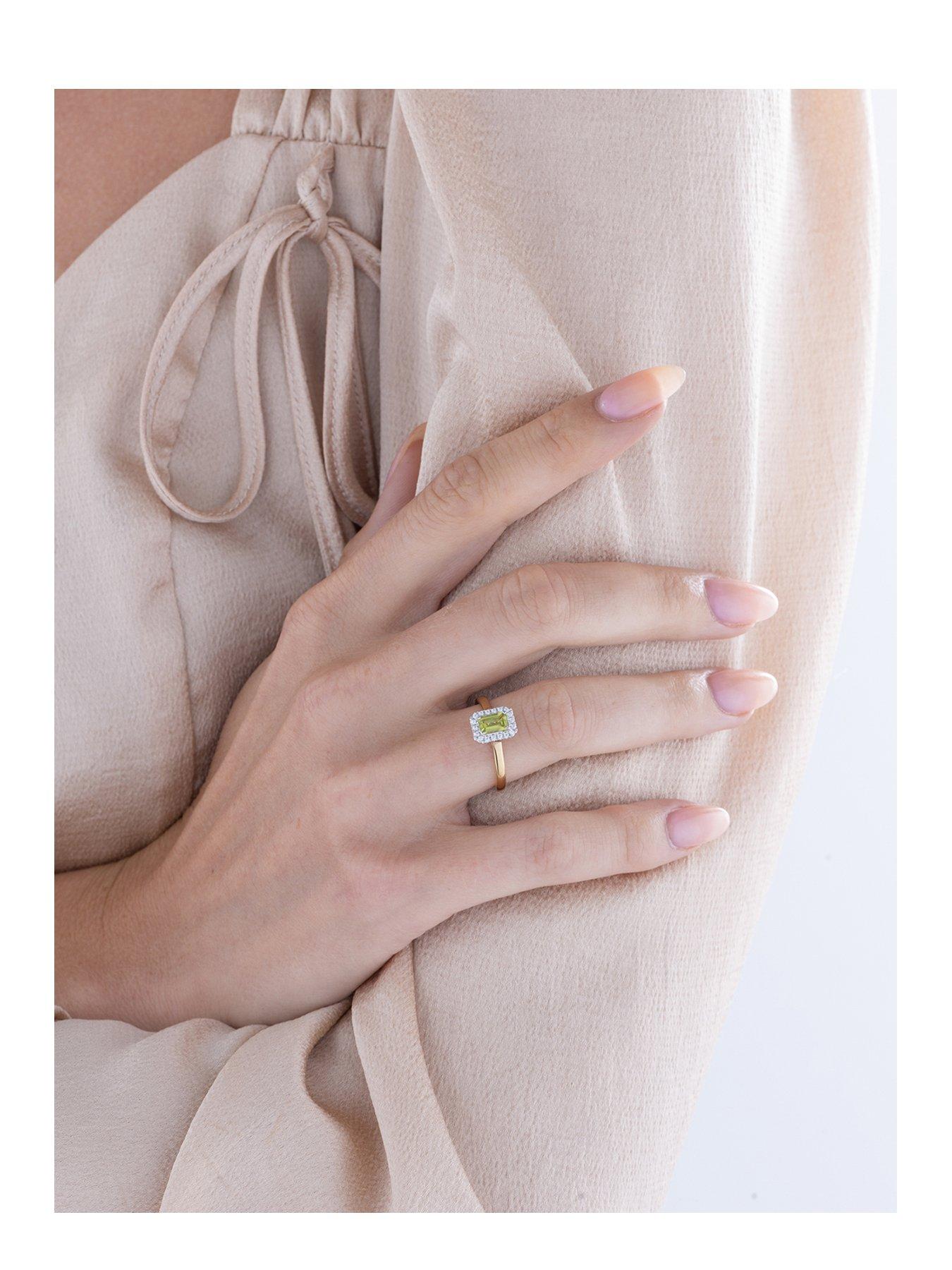  image of love-diamond-peridot-diamond-halo-ring