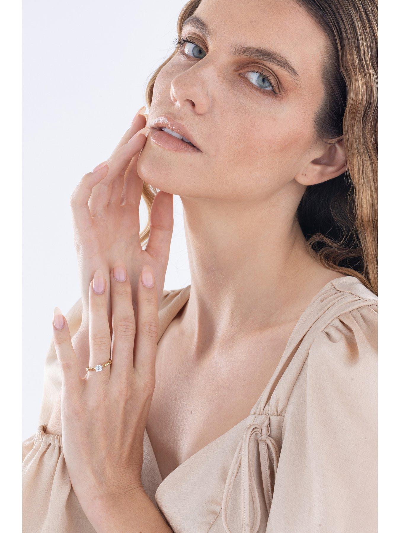  image of love-diamond-diamond-solitaire-ring-with-twisted-shoulders-g-vs-lab-grown
