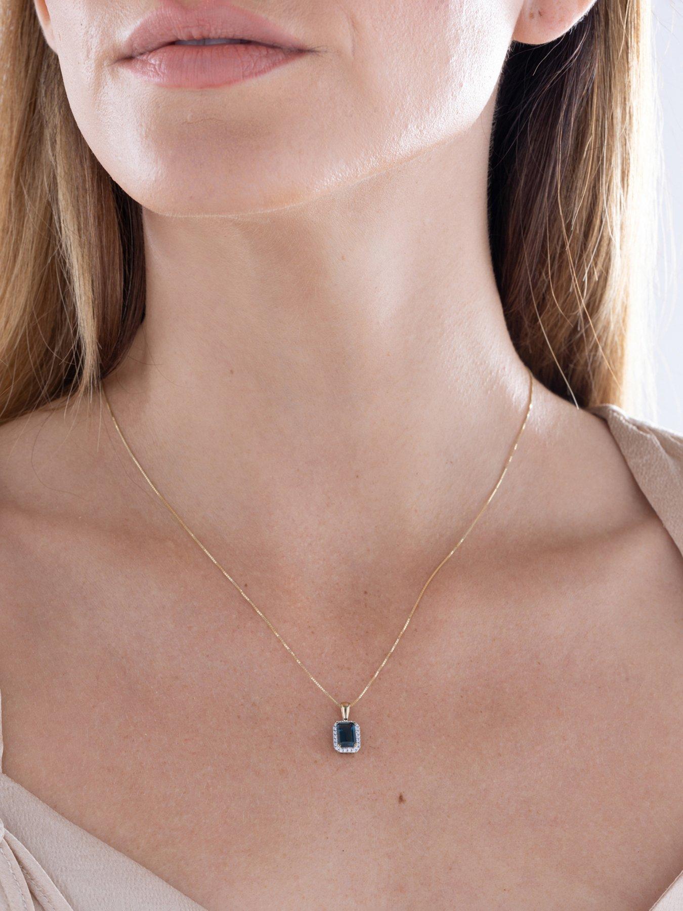  image of love-diamond-london-blue-topaz-diamond-halo-necklace