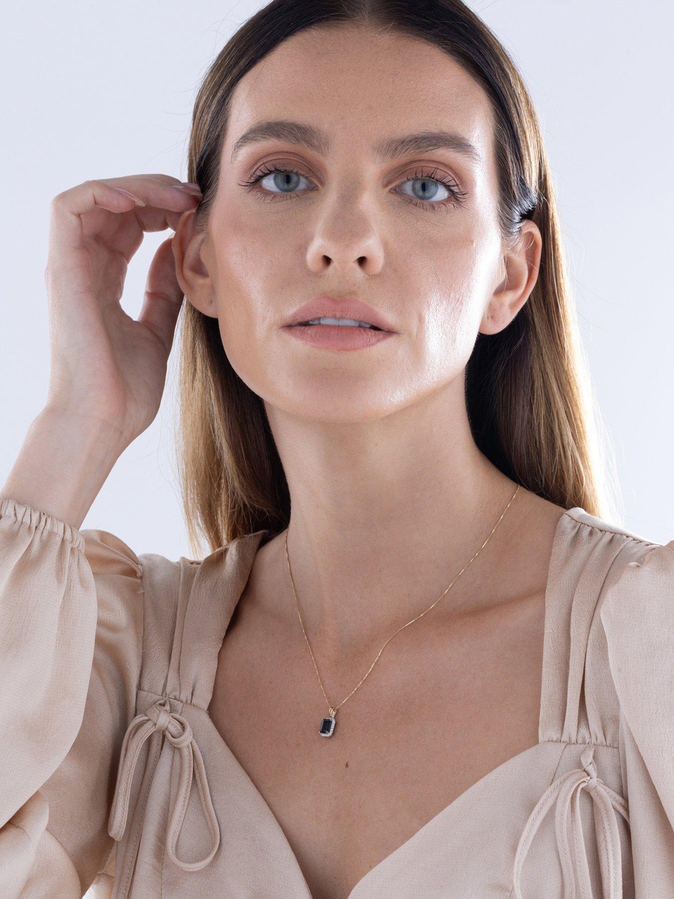  image of love-diamond-london-blue-topaz-diamond-halo-necklace