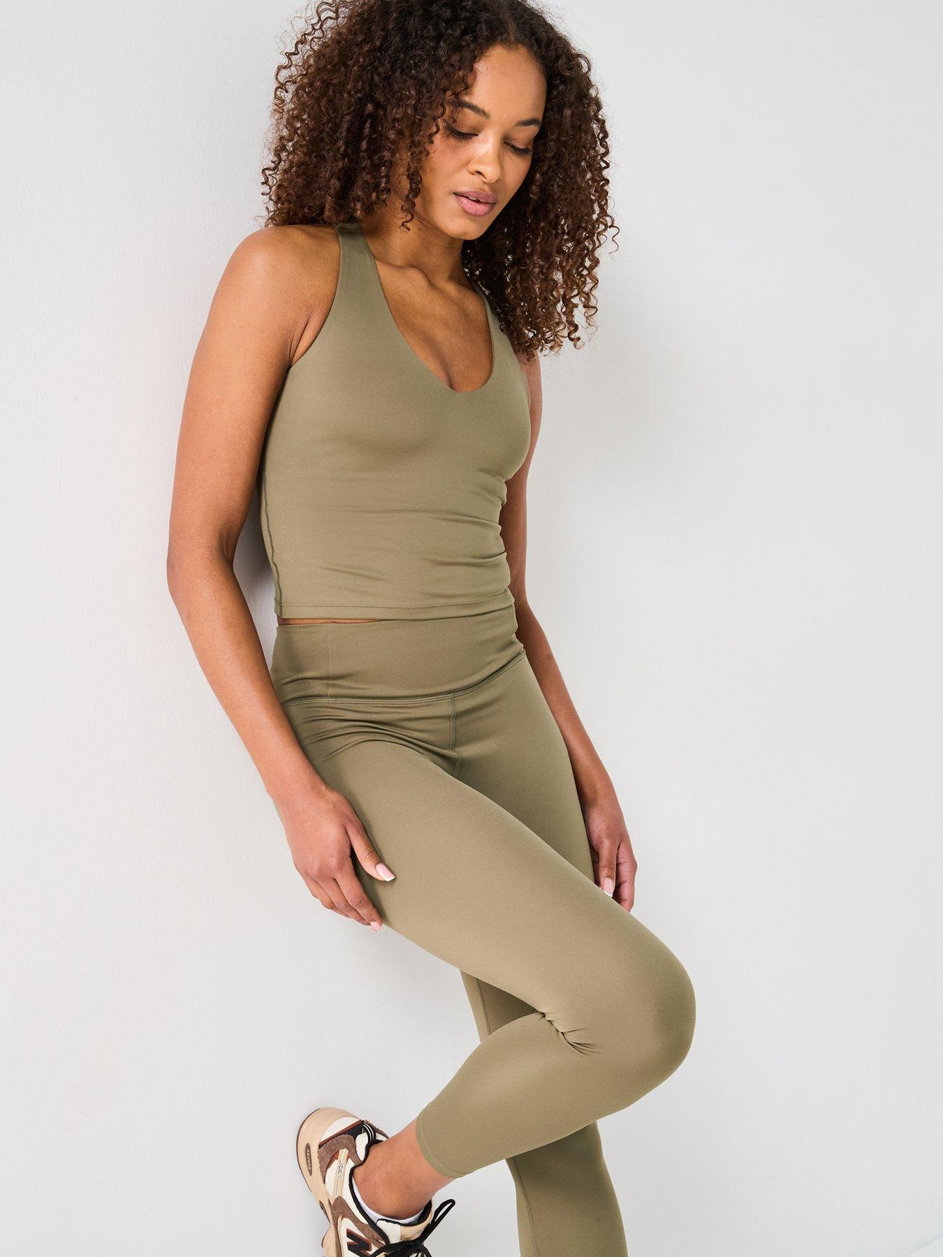  image of girlfriend-collective-womens-training-float-cross-back-zoe-tank-green