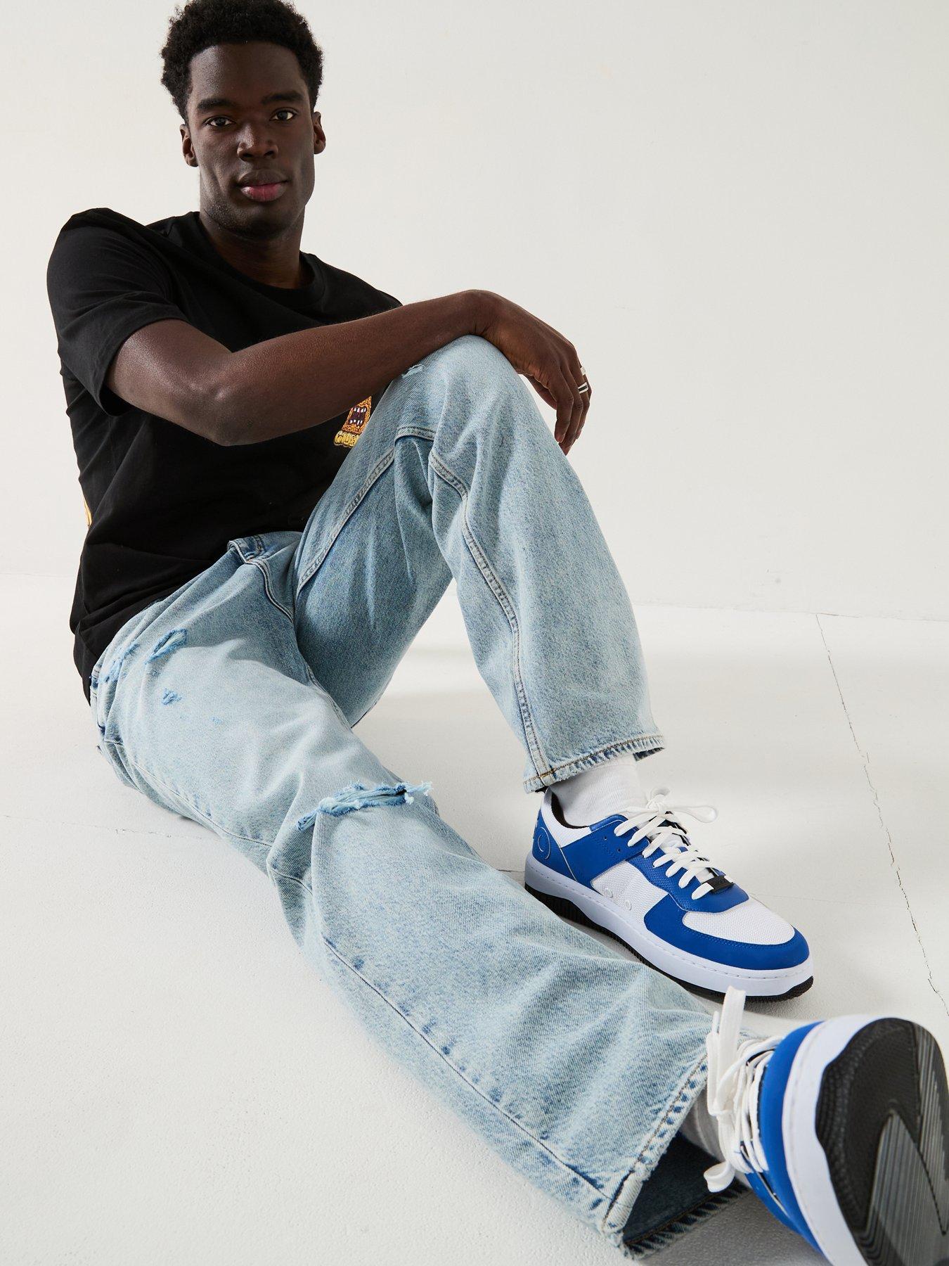 image of hugo-nate-ripped-baggy-fit-jeans-blue