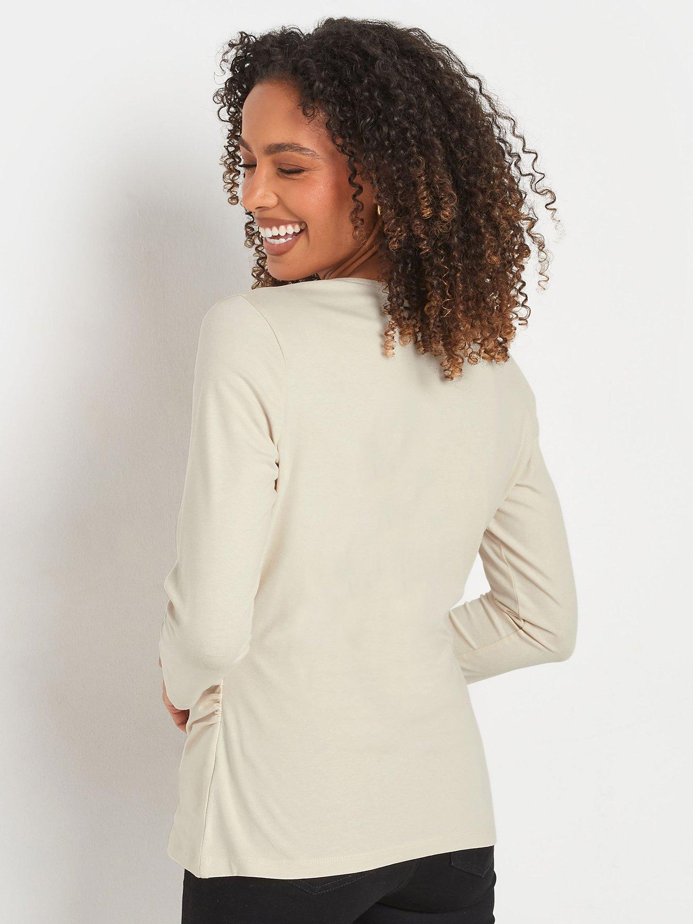  image of mco-34-sleeve-wrap-top-ivory