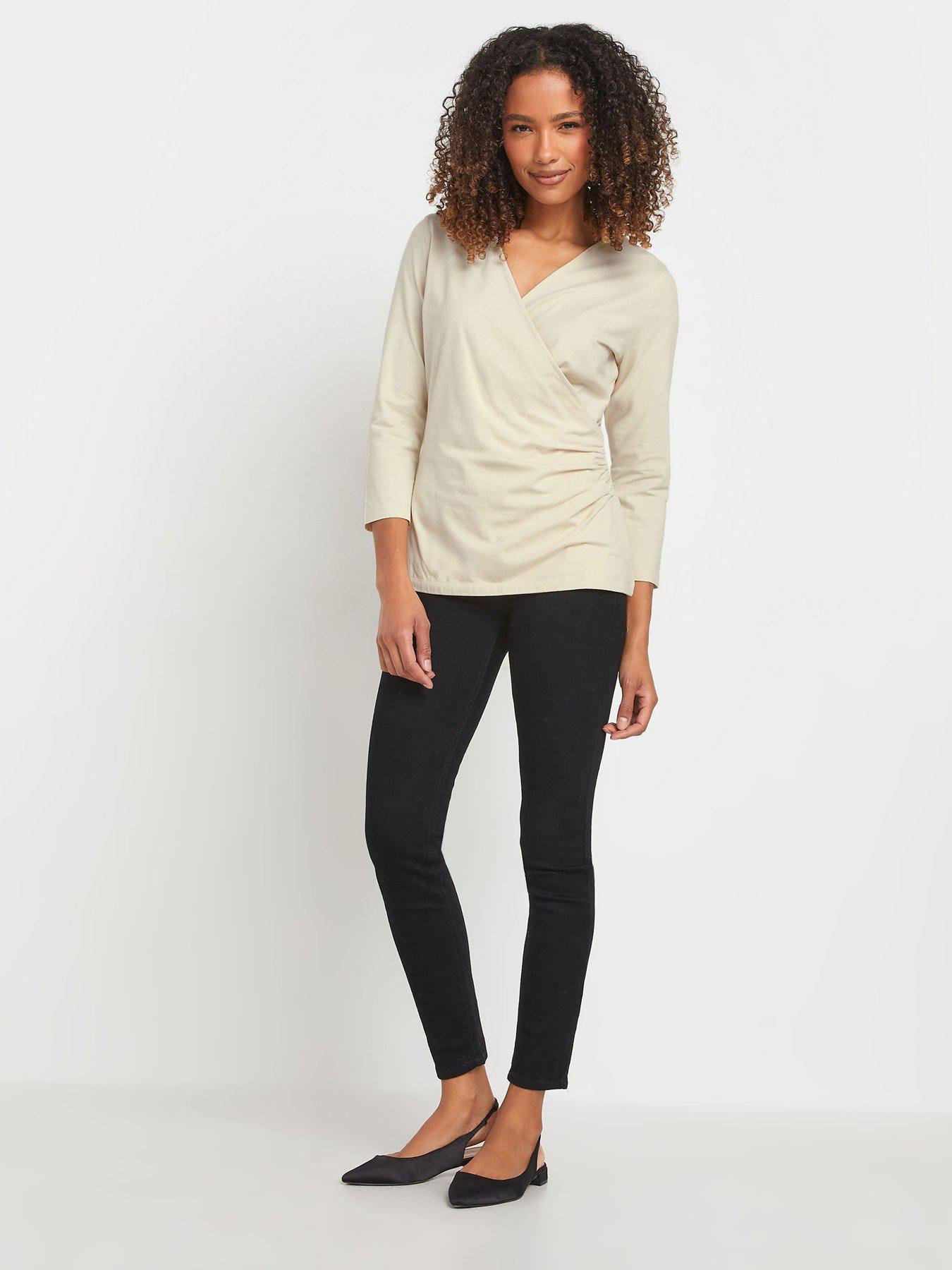  image of mco-34-sleeve-wrap-top-ivory