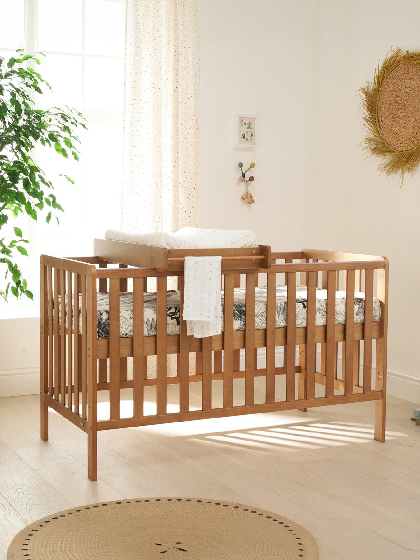 front image of tutti-bambini-malmo-cot-bed-cot-top-changer-and-mattress-bundle-oak