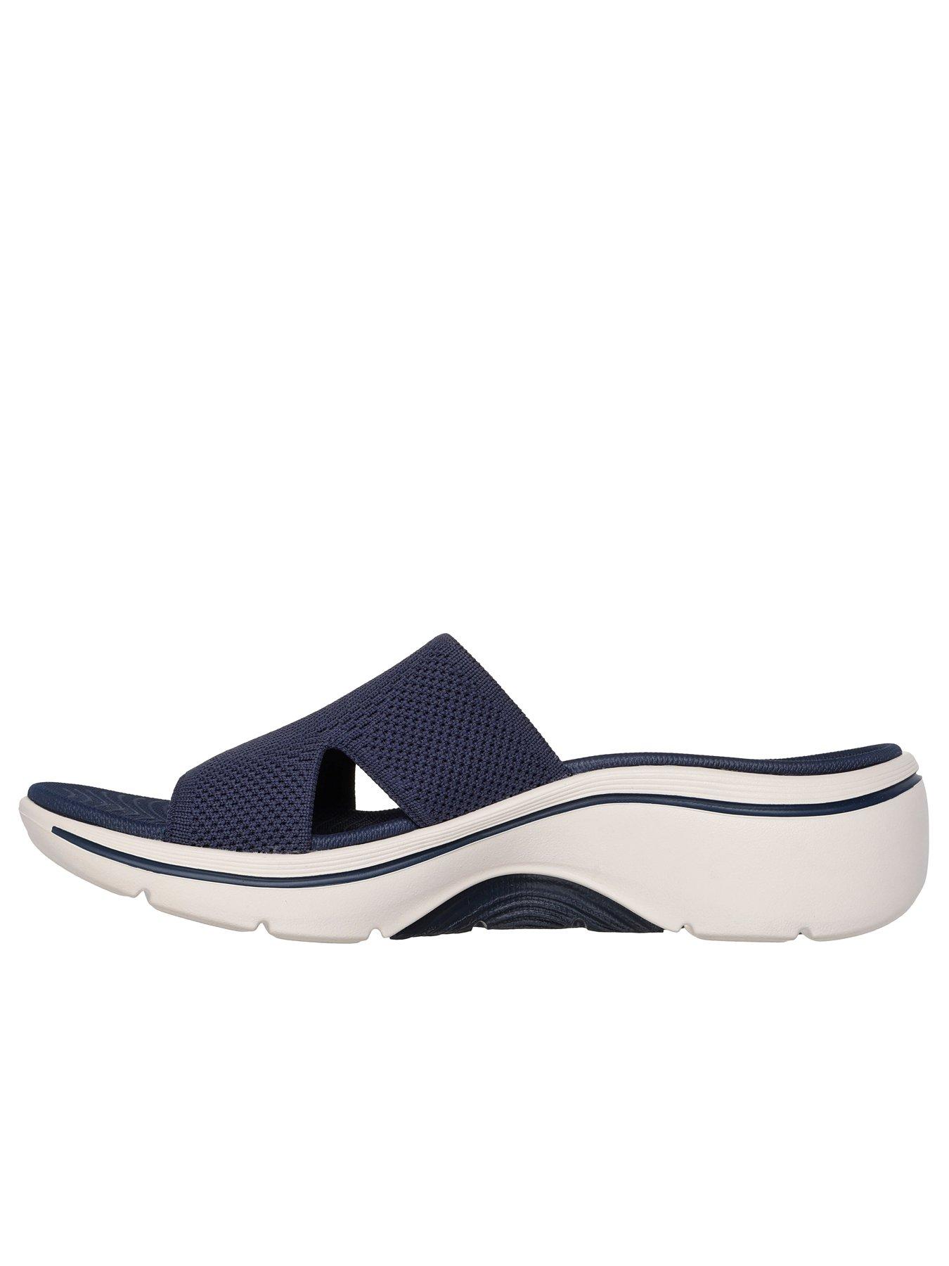  image of skechers-go-walk-arch-fit-20-sandal-quick-dry-finished-knit-slide-w-peekaboo-detail-navy