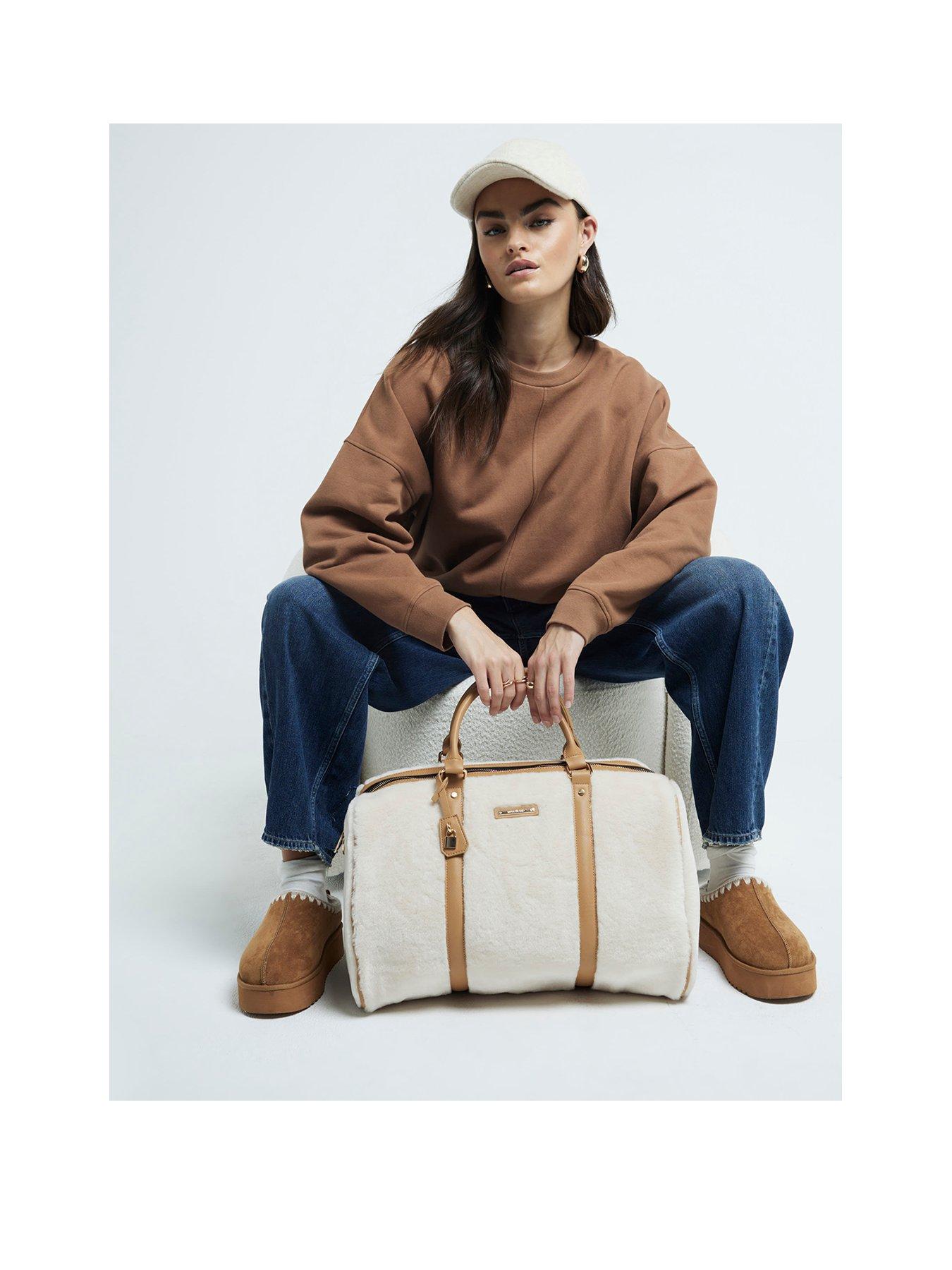  image of river-island-4049-panelled-fur-lock-barrel-bag