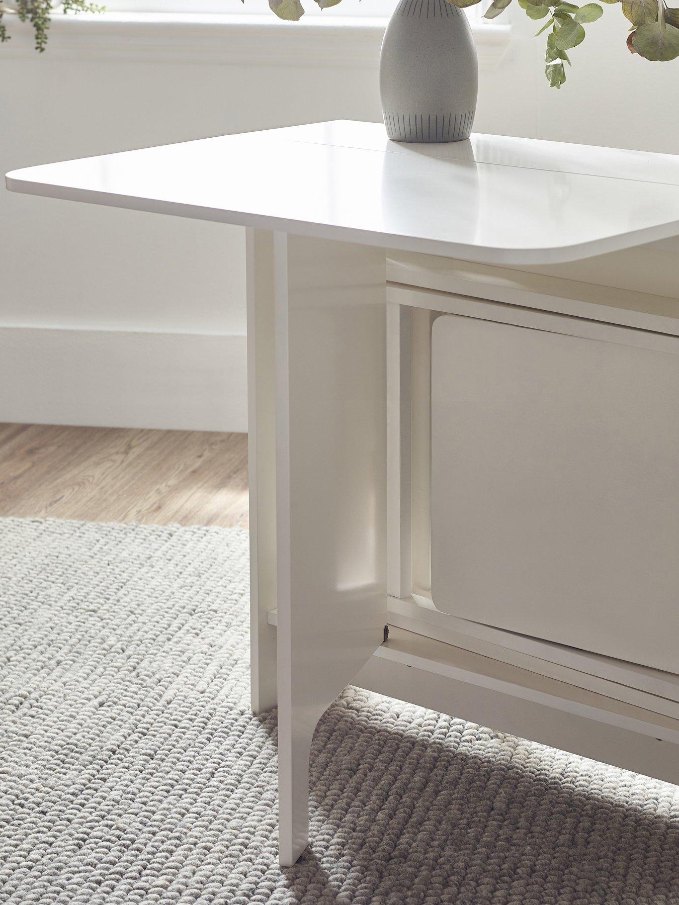  image of julian-bowen-gatan-small-gateleg-dining-table-with-2-chairs-white