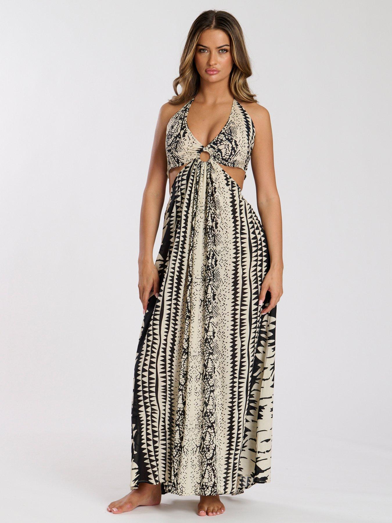  image of south-beach-printed-halter-neck-ring-detail-beach-maxi-dress