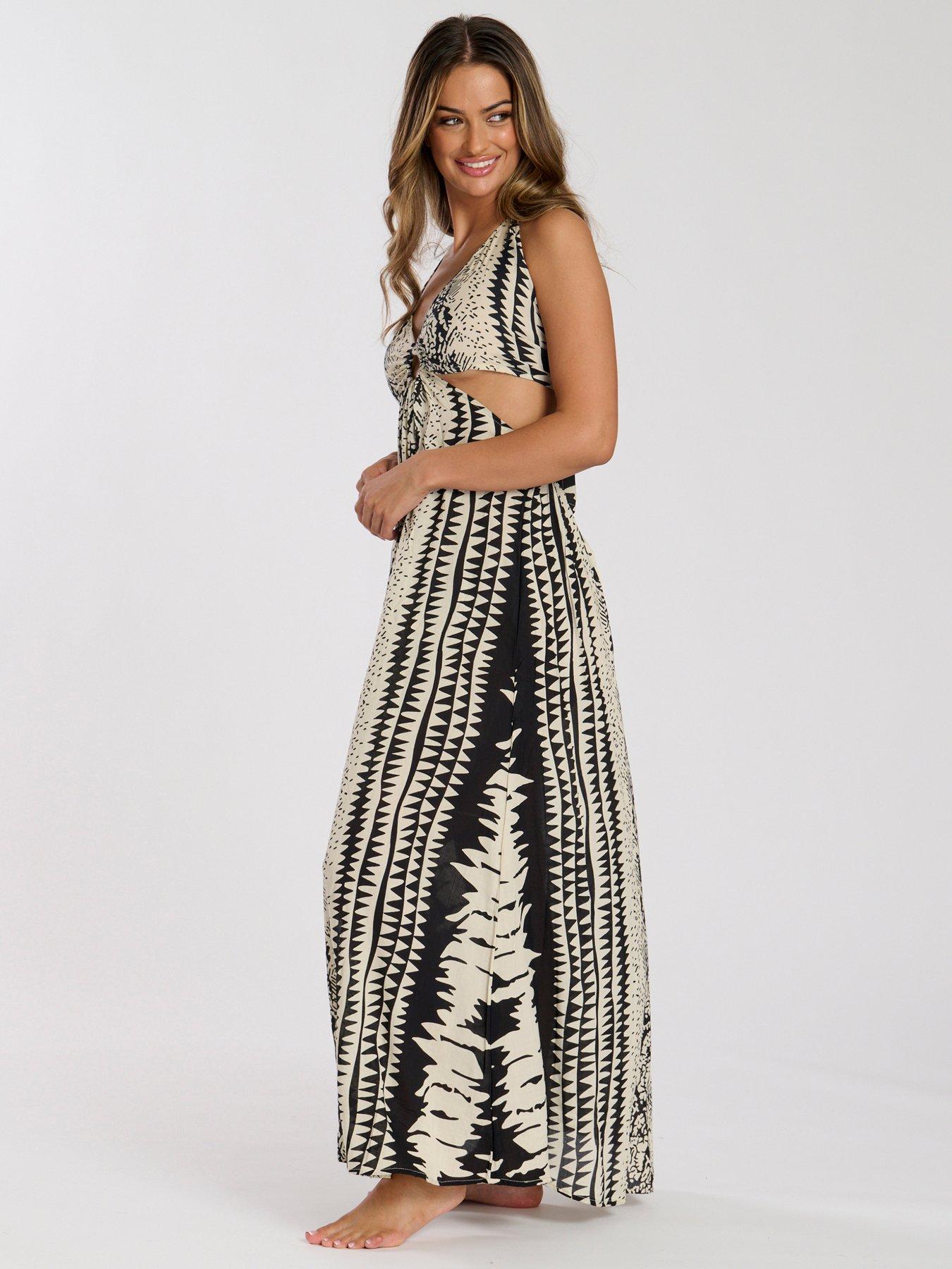  image of south-beach-printed-halter-neck-ring-detail-beach-maxi-dress