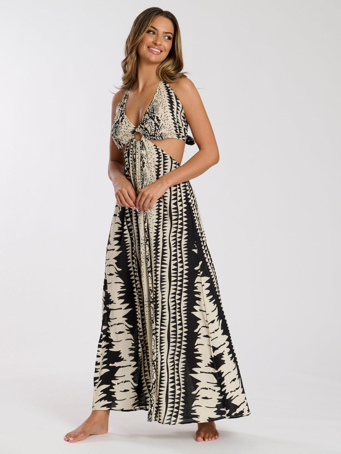  image of south-beach-printed-halter-neck-ring-detail-beach-maxi-dress