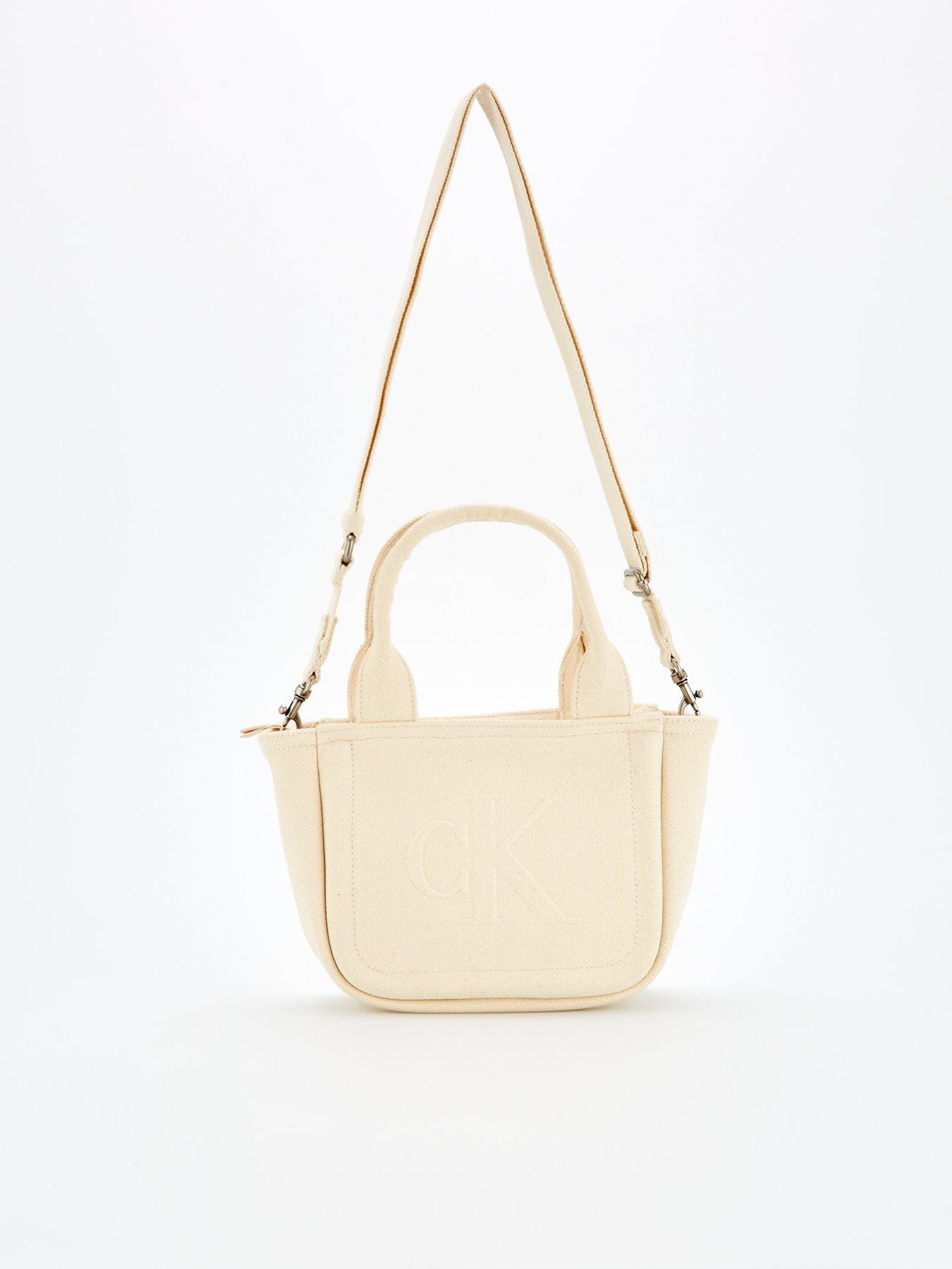  image of calvin-klein-woven-camera-bag-white