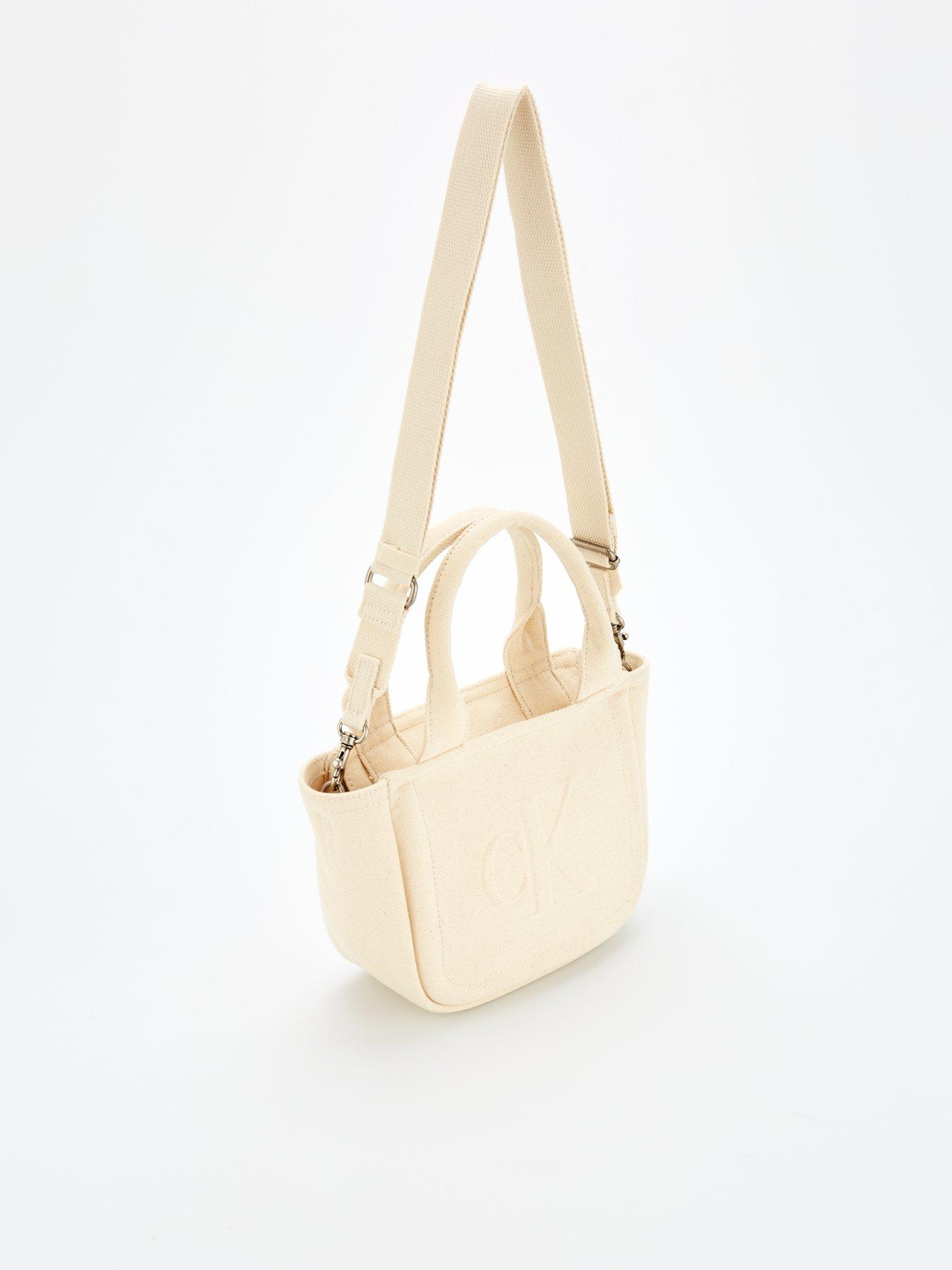  image of calvin-klein-woven-camera-bag-white