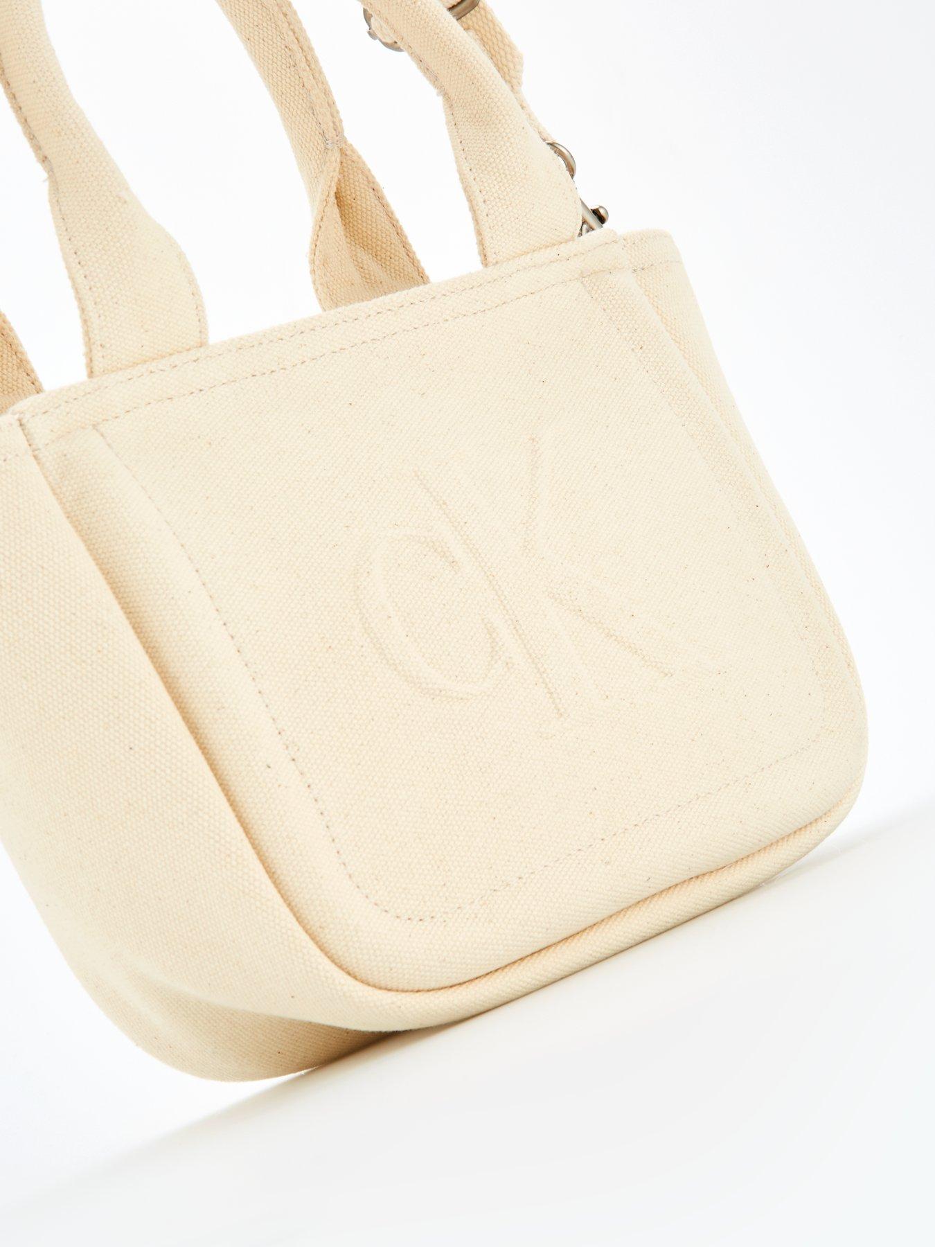  image of calvin-klein-woven-camera-bag-white
