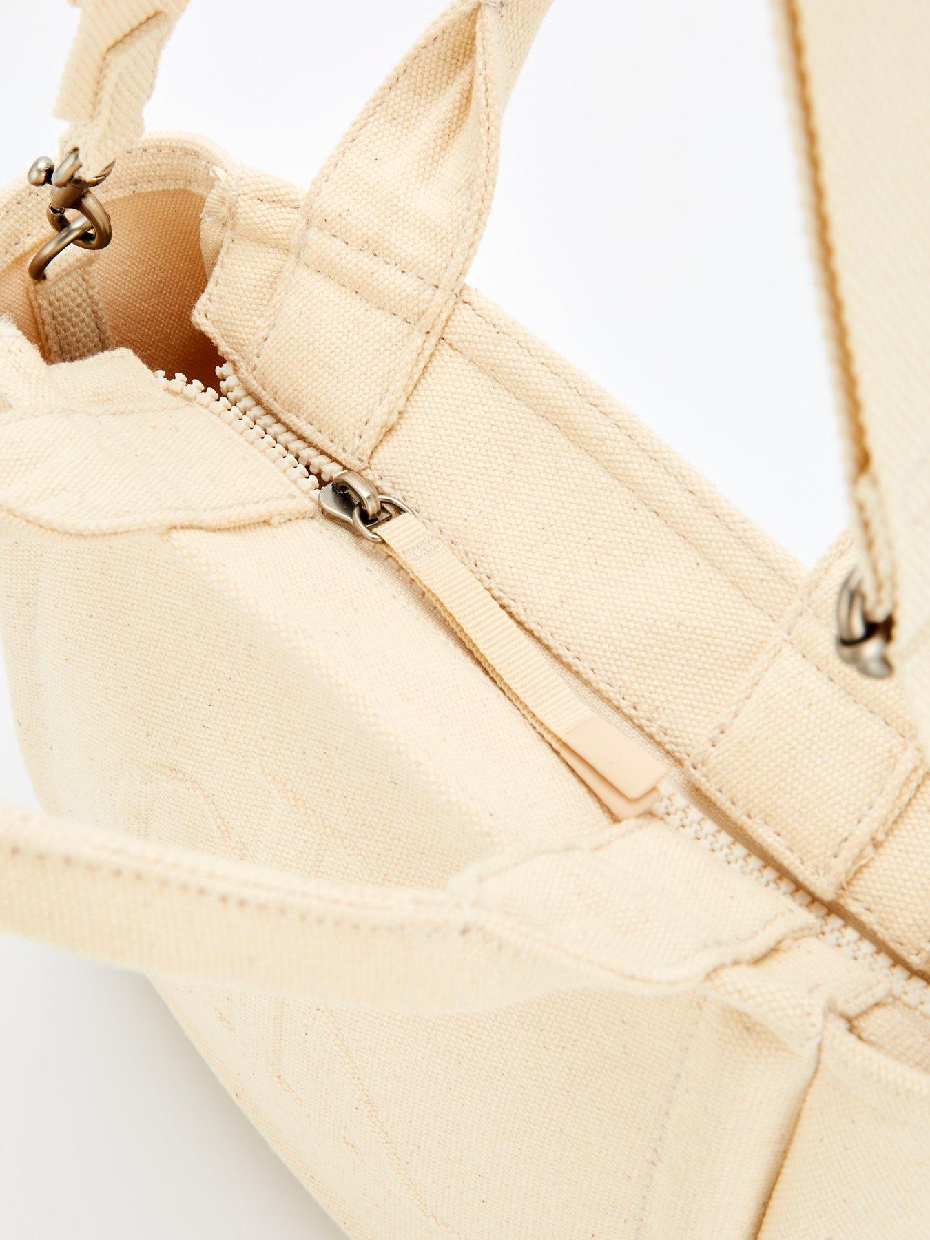  image of calvin-klein-woven-camera-bag-white