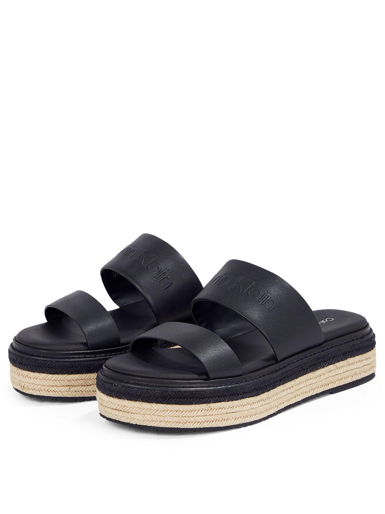  image of calvin-klein-flatform-wedge-slide-black