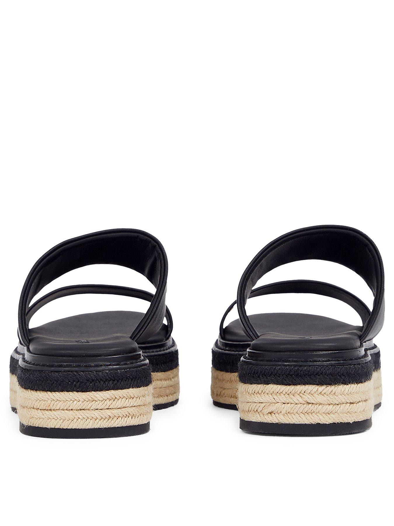  image of calvin-klein-flatform-wedge-slide-black