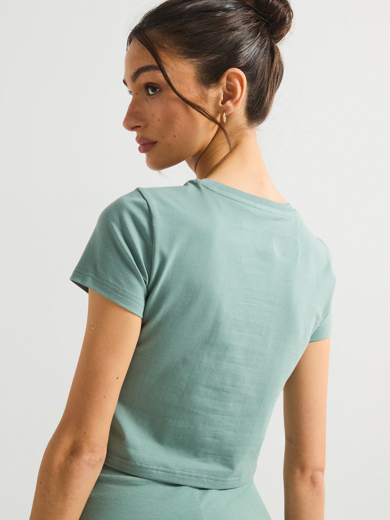  image of puma-womens-wardrobe-essentials-tee-green