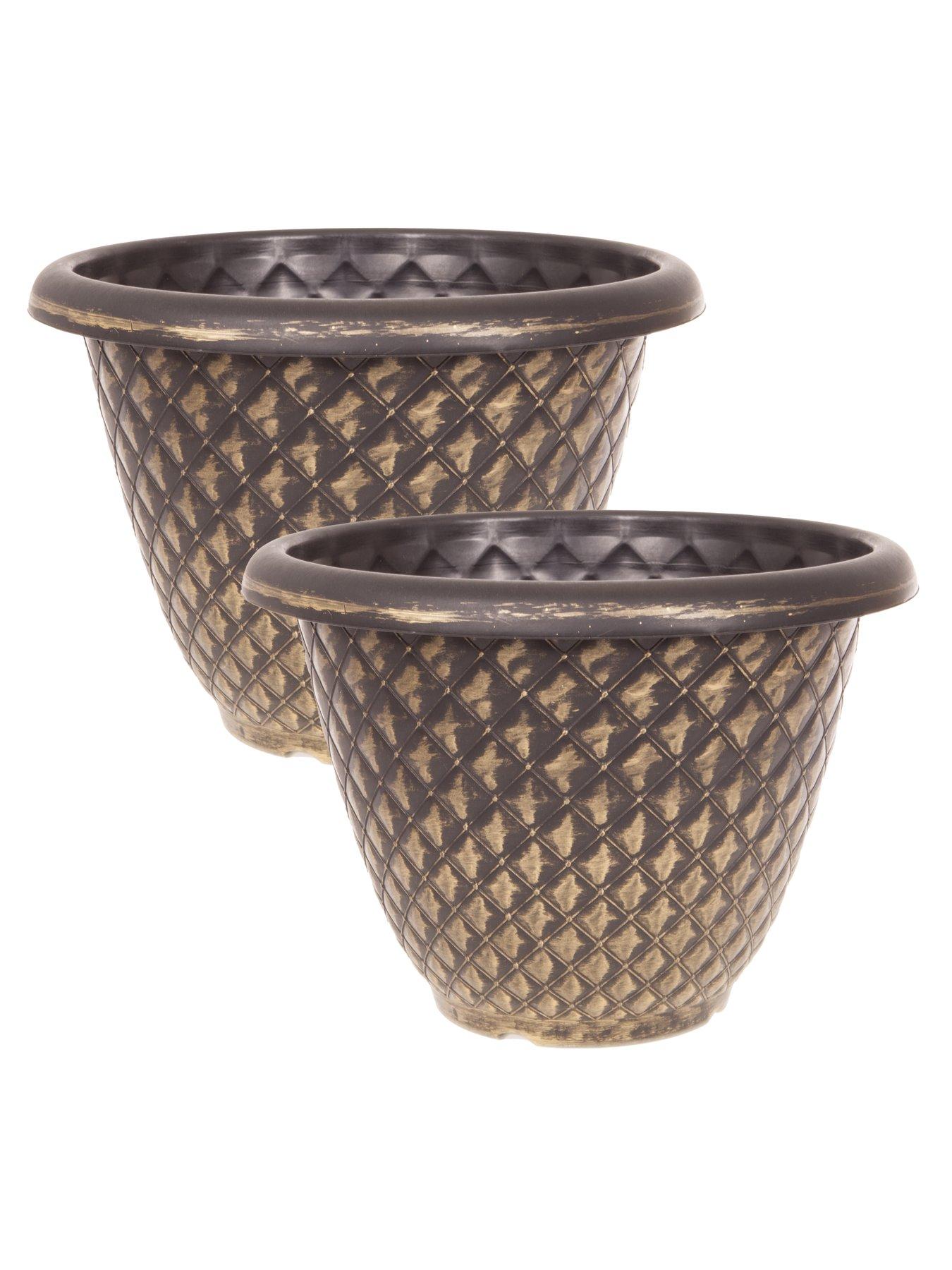  image of pair-of-holly-trees-with-decorative-pots