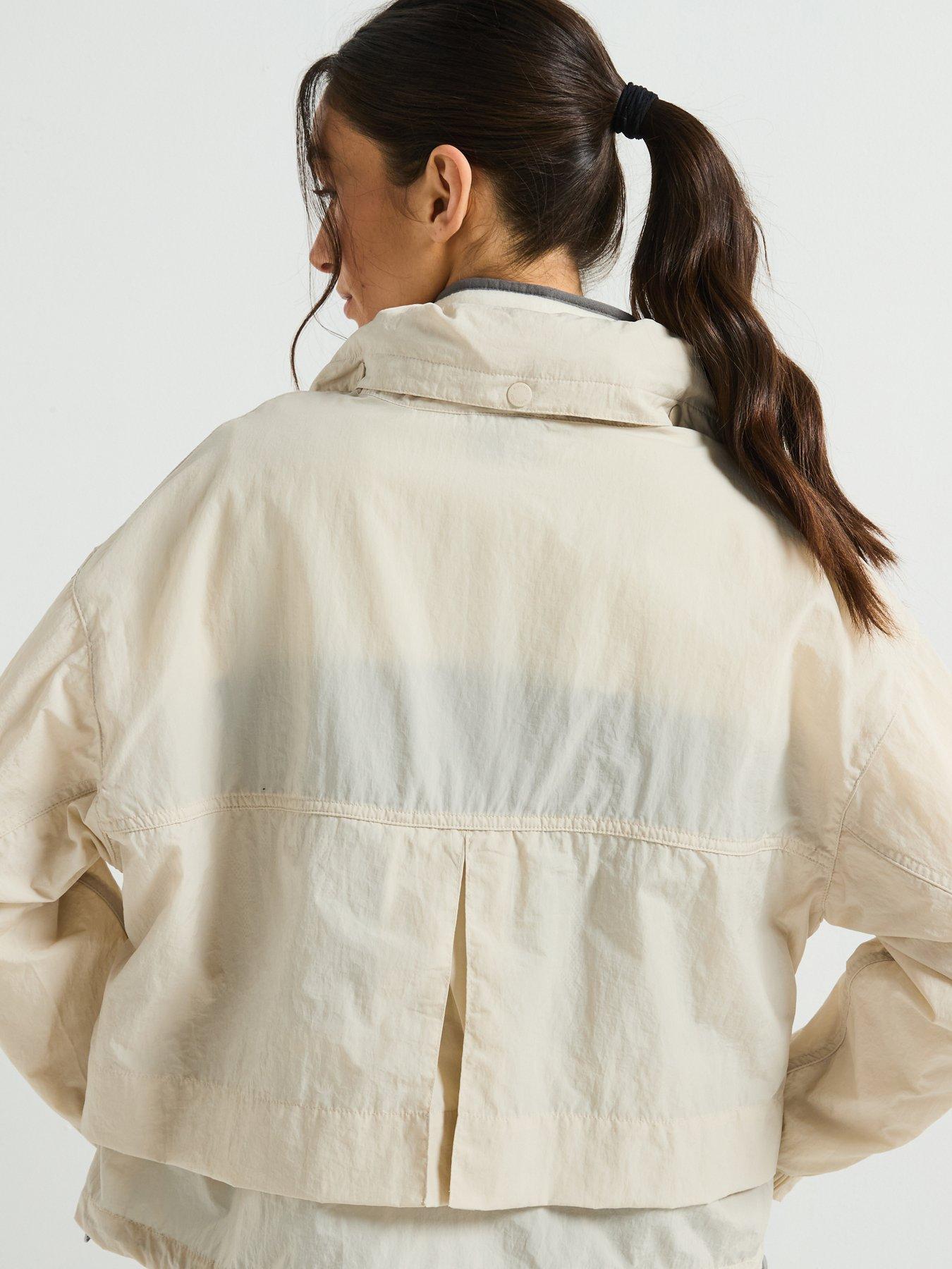  image of columbia-womens-paracutie-2-windbreaker-beige