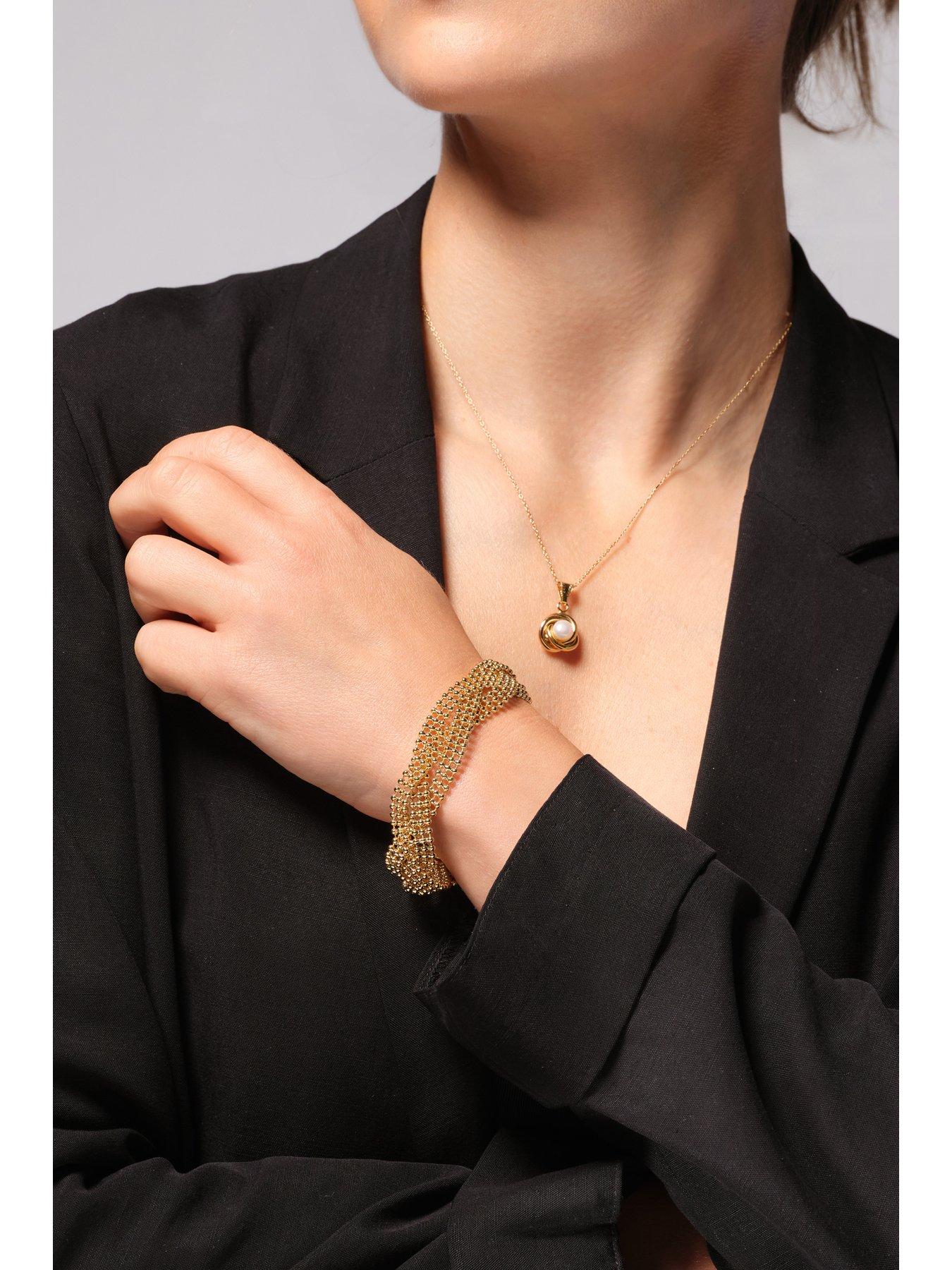 image of the-love-collection-gold-plated-sterling-silver-freshwater-pearl-knot-necklace