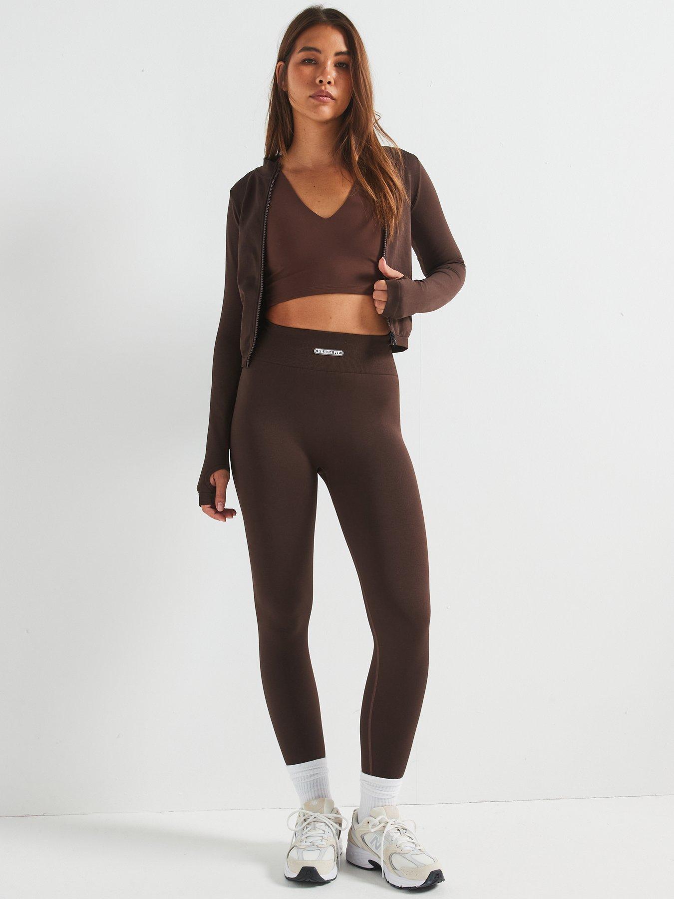  image of peach-fit-womens-lucia-zip-thru-top-brown
