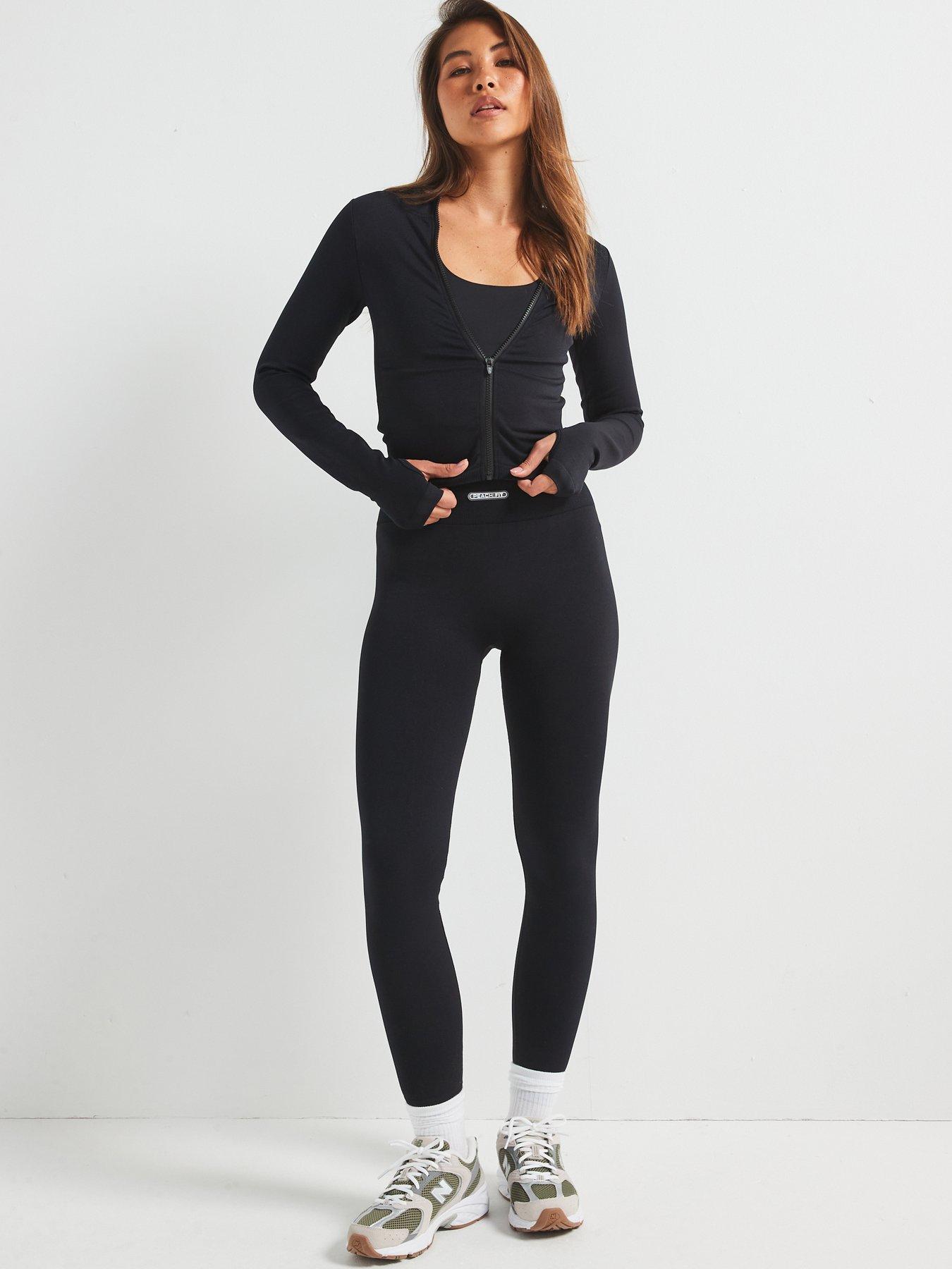  image of peach-fit-womens-lucia-zip-thru-top-black