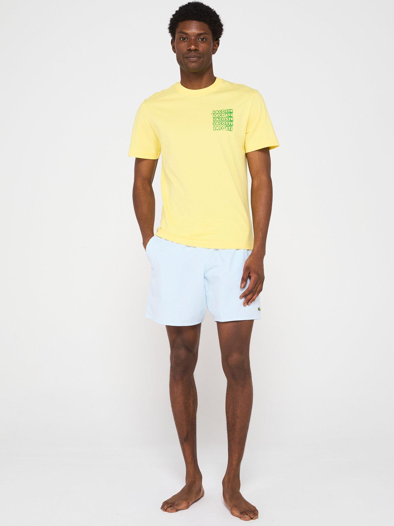  image of lacoste-striped-seersucker-swim-trunks-blue