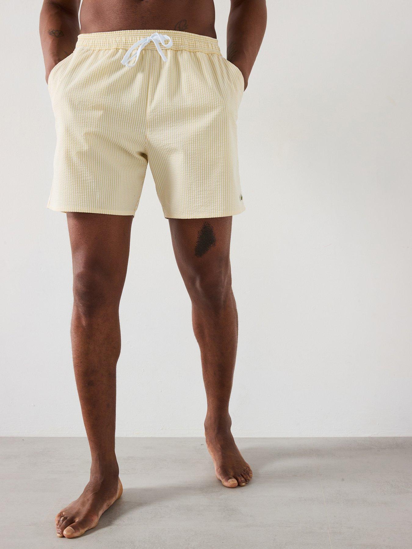 lacoste-striped-seersucker-swim-trunks-yellow