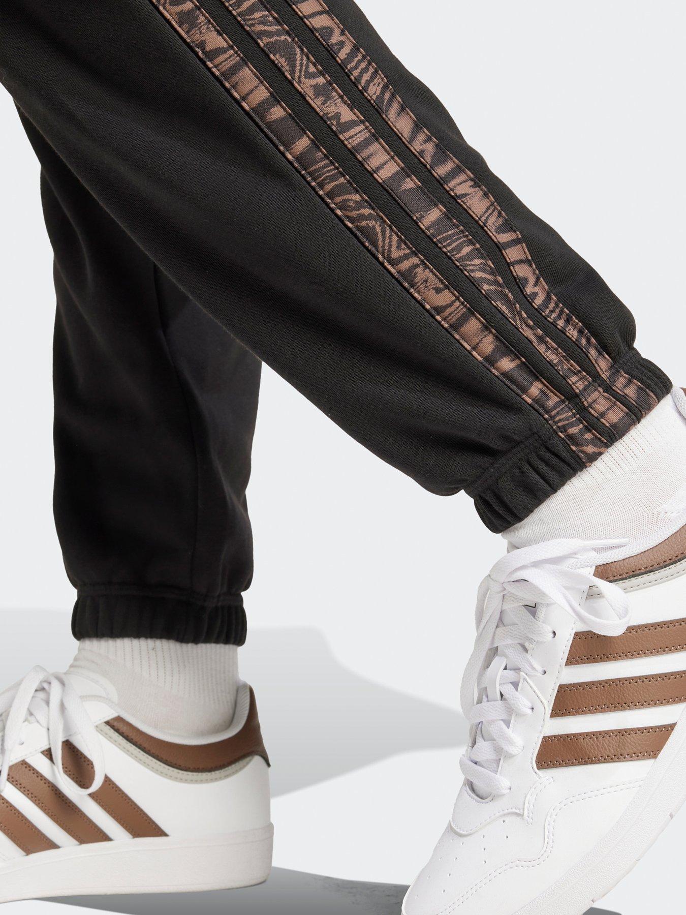  image of adidas-sportswear-womens-essentials-seasonals-animal-joggers-black